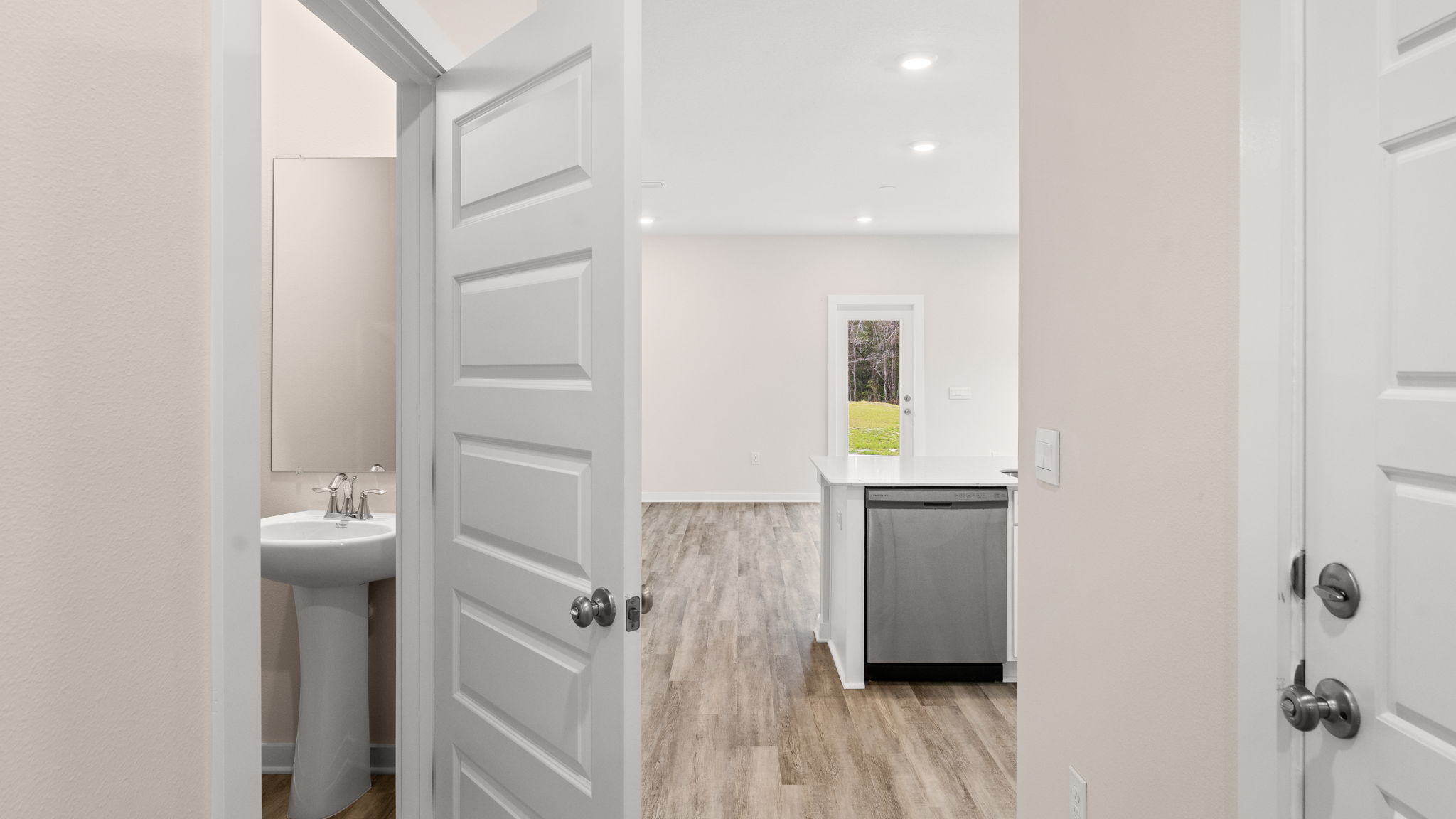 The hall bathroom is located off the entry hall