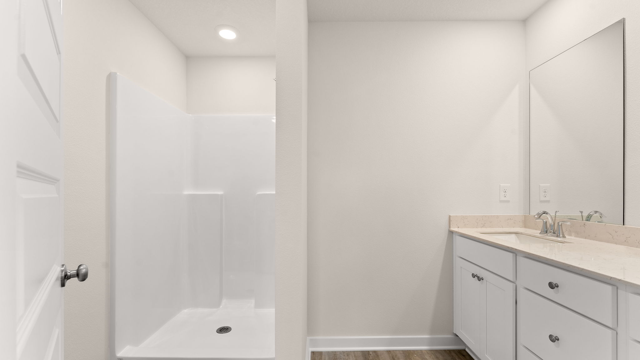 There is an ensuite bathroom in the primary bedroom