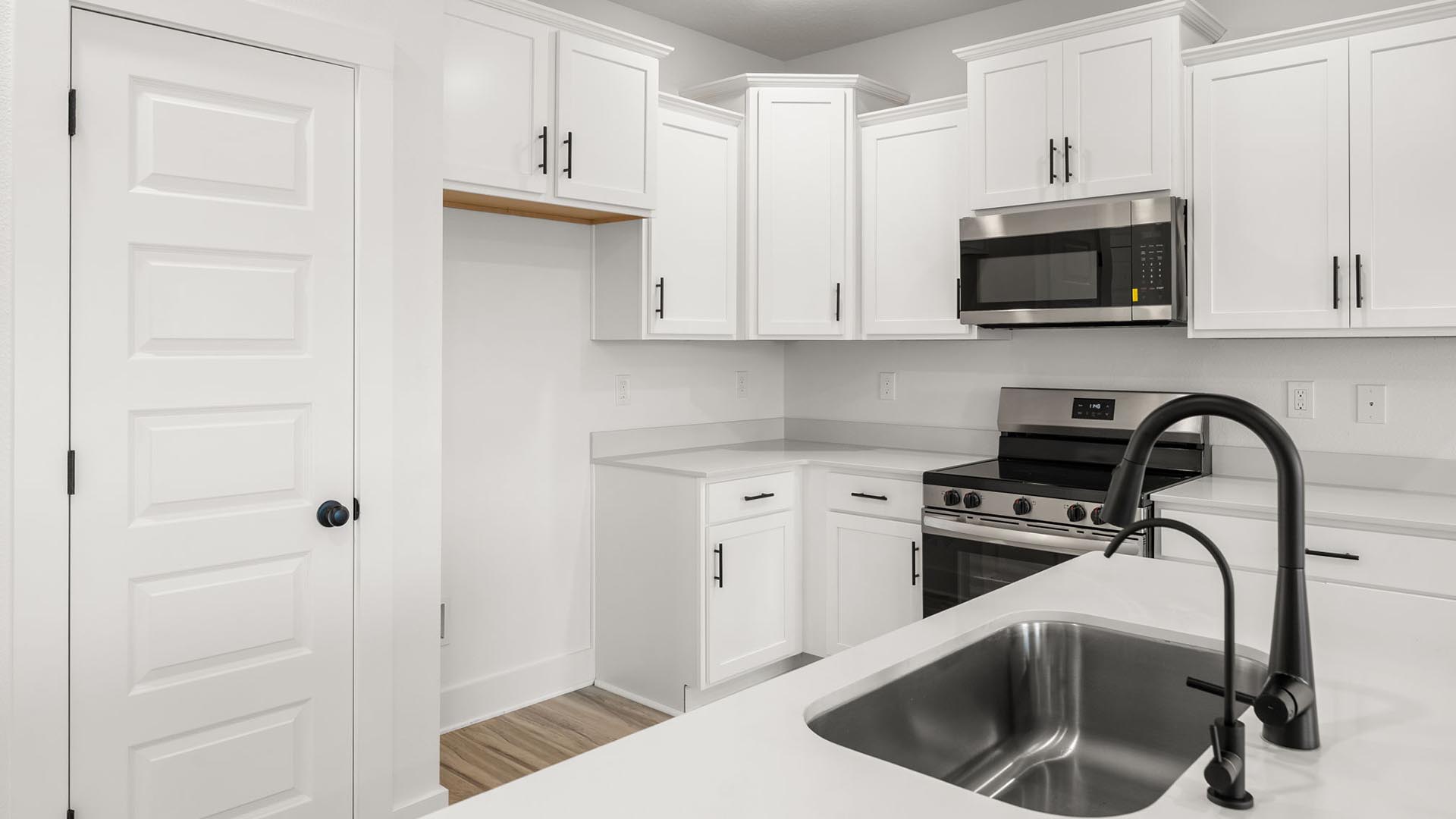 The kitchen serves as the heart of the townhome with a center island