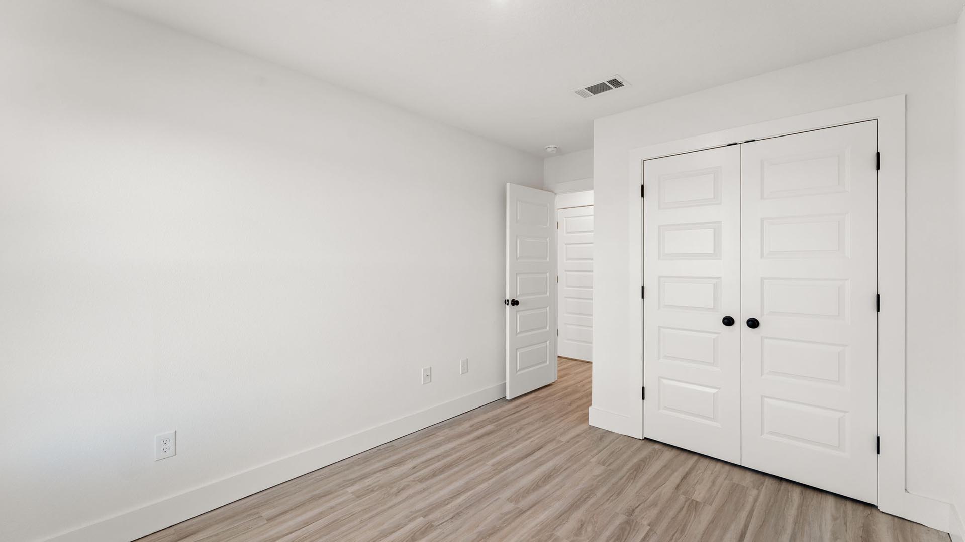 Guest bedroom two has ample closet space