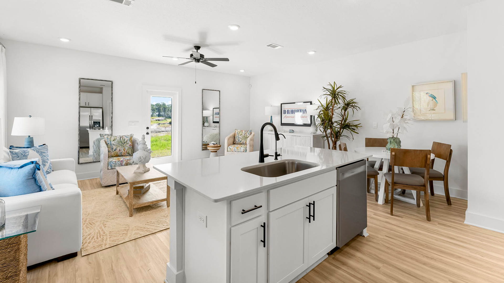 The kitchen is open to the living and dining areas