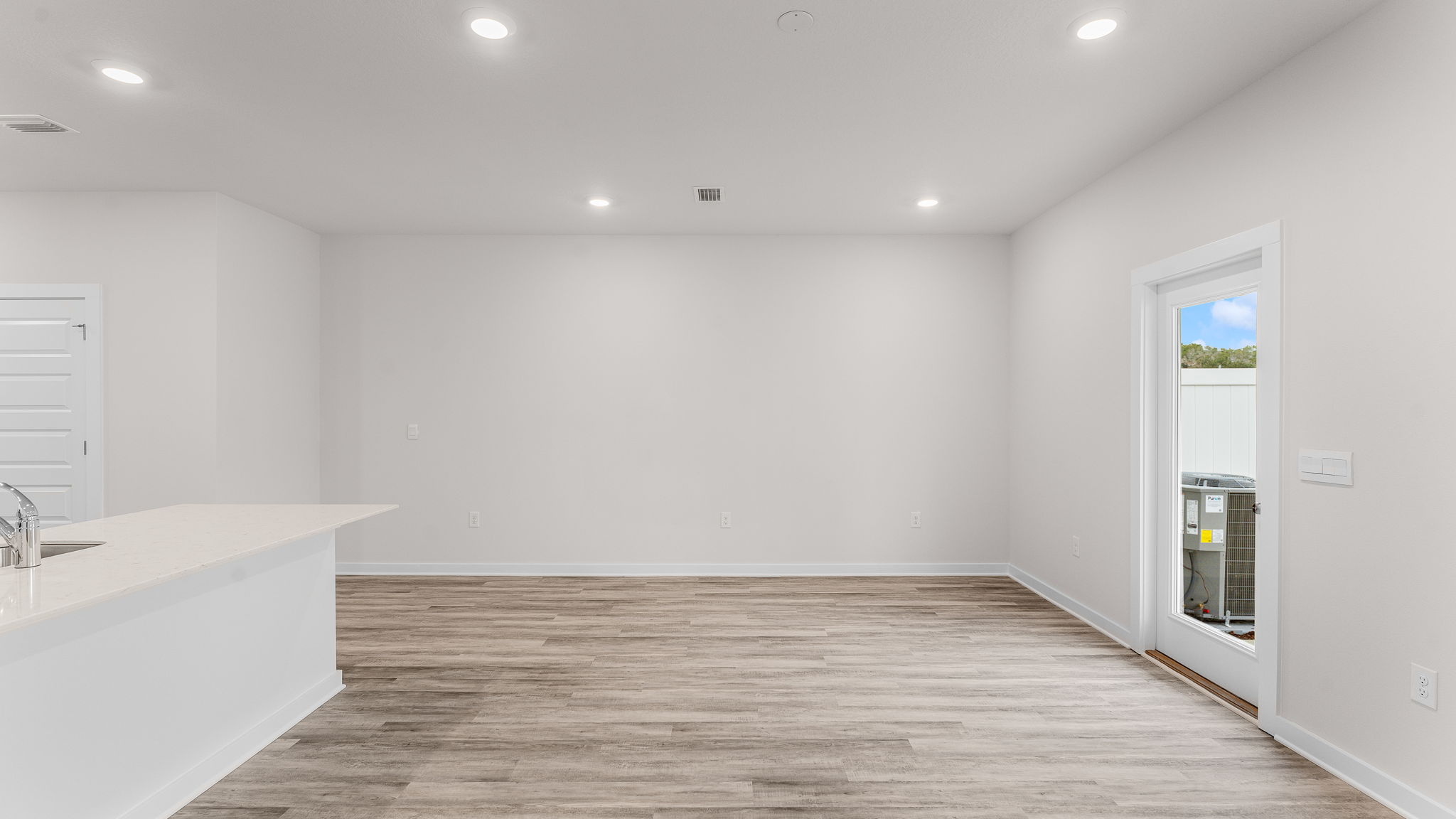 The living area on the main level serves as the heart of the home