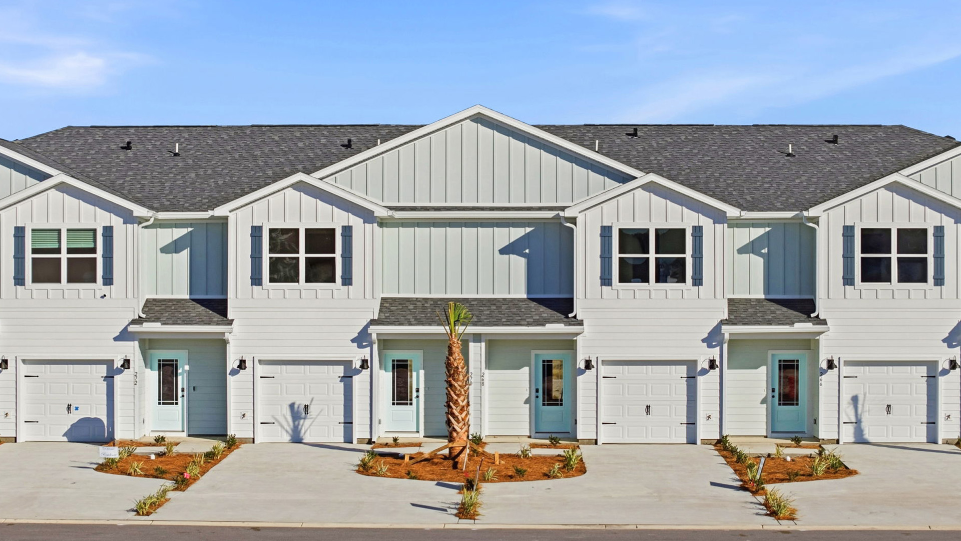 255 Phillips Bluff Avenue is under construction. This is interior unit townhome with a pond view from the back patio