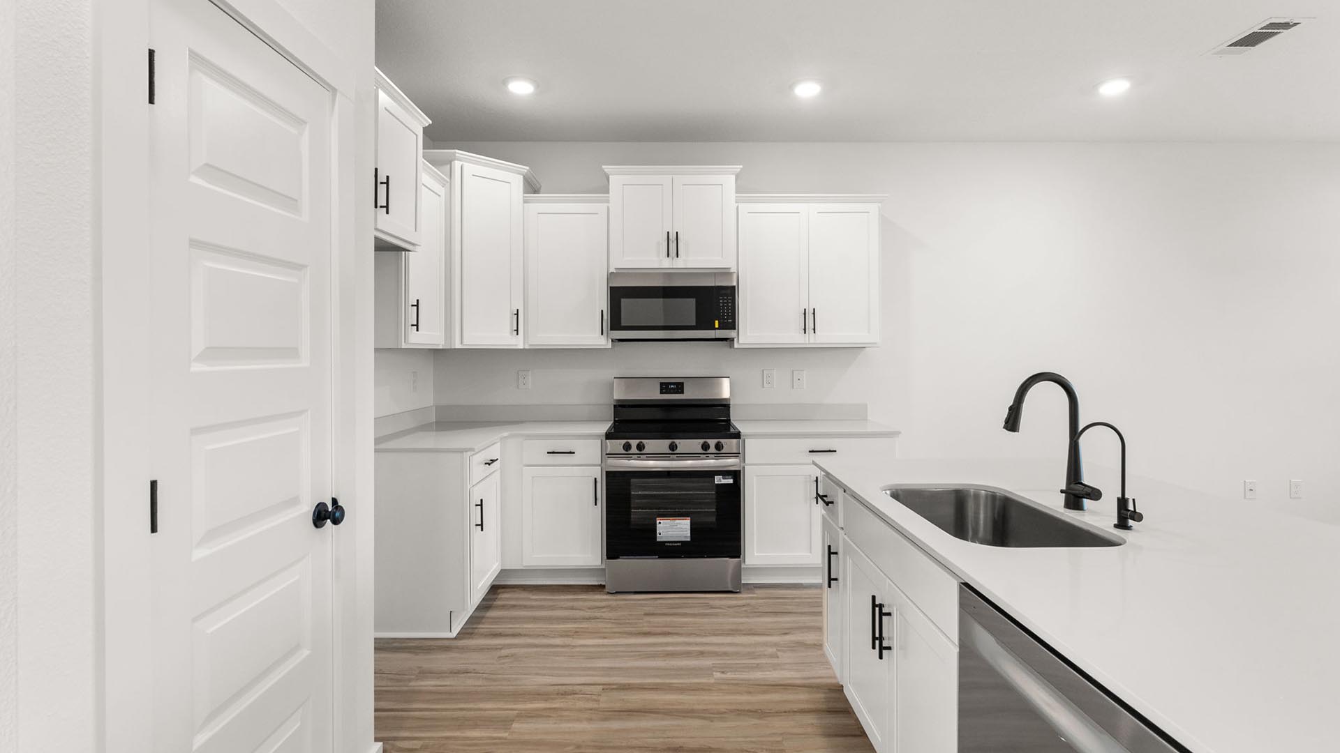 The kitchen serves as the heart of the townhome with a center island
