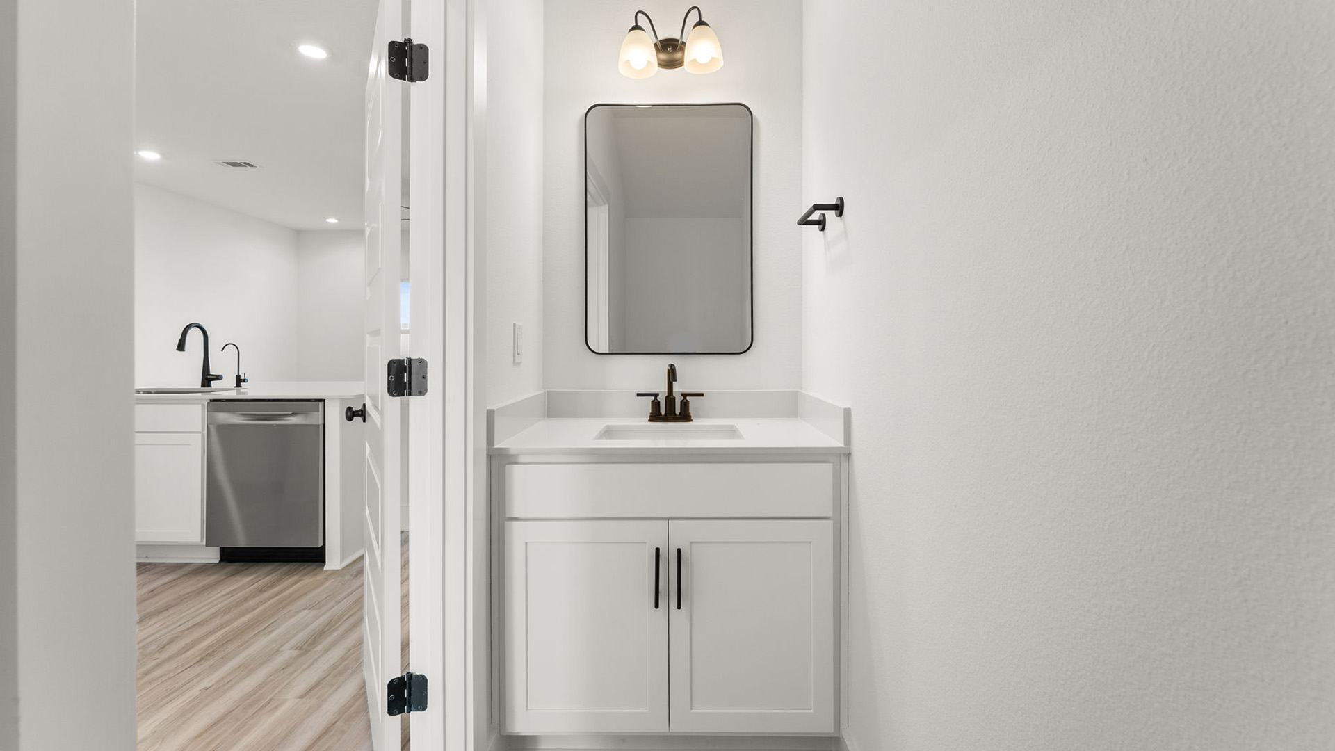 There is a half bath off the entry hall on the main level