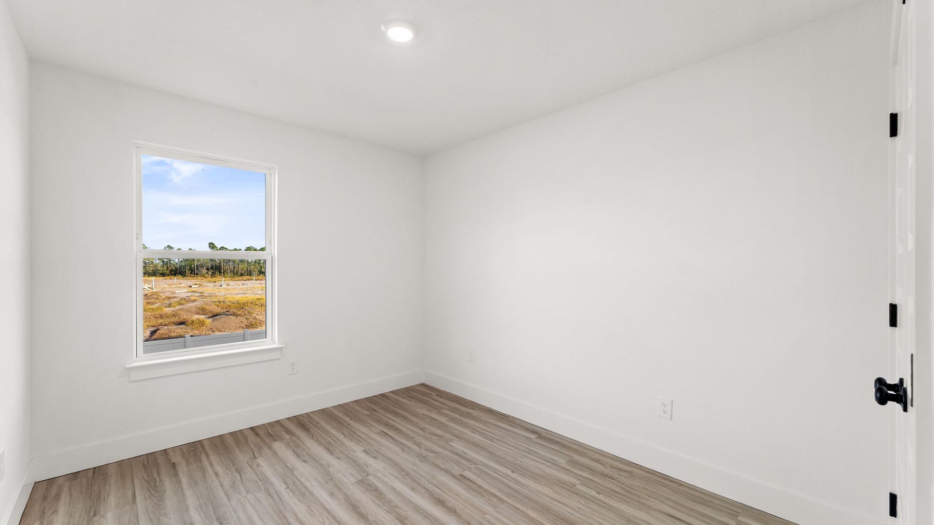 The two additional bedrooms are on the second floor at the back of the townhome