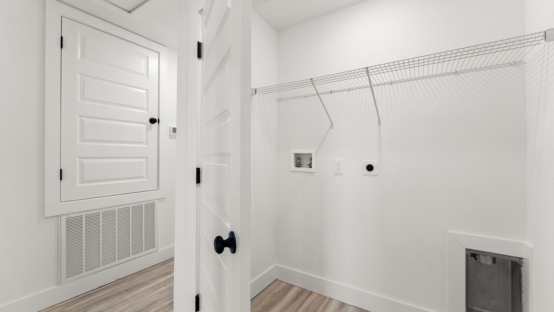 There is a laundry area on the second level