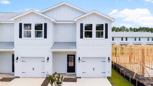 The Palm Townhomes have a single car garage