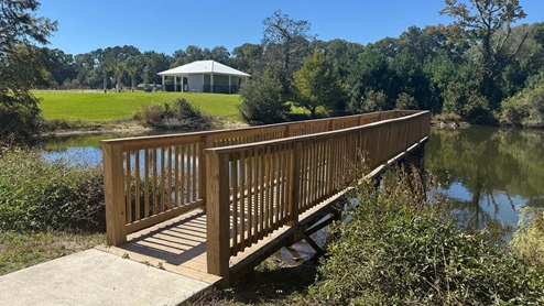 The pond is behind the amenity at Genoa Landing