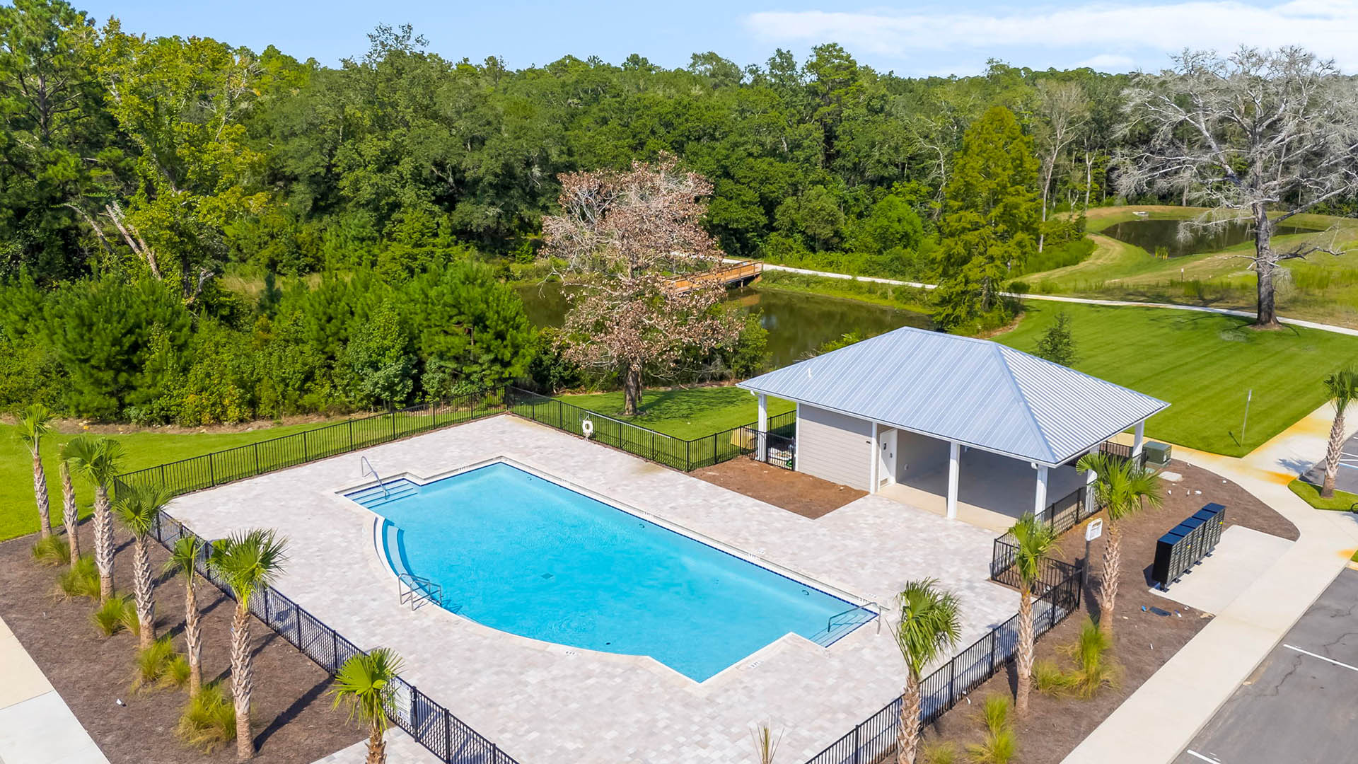 The pool house and pool is located at the back of the community