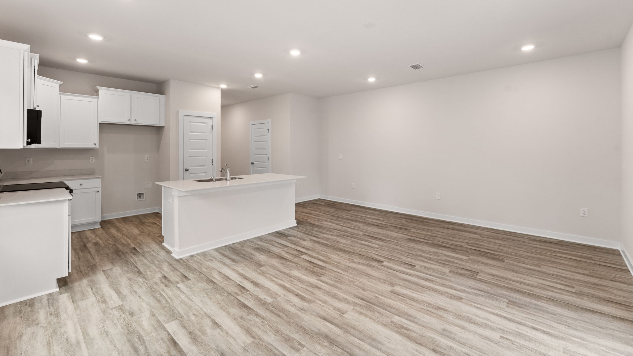 The main level serves as the heart of the home where family and guests and interact comfortably