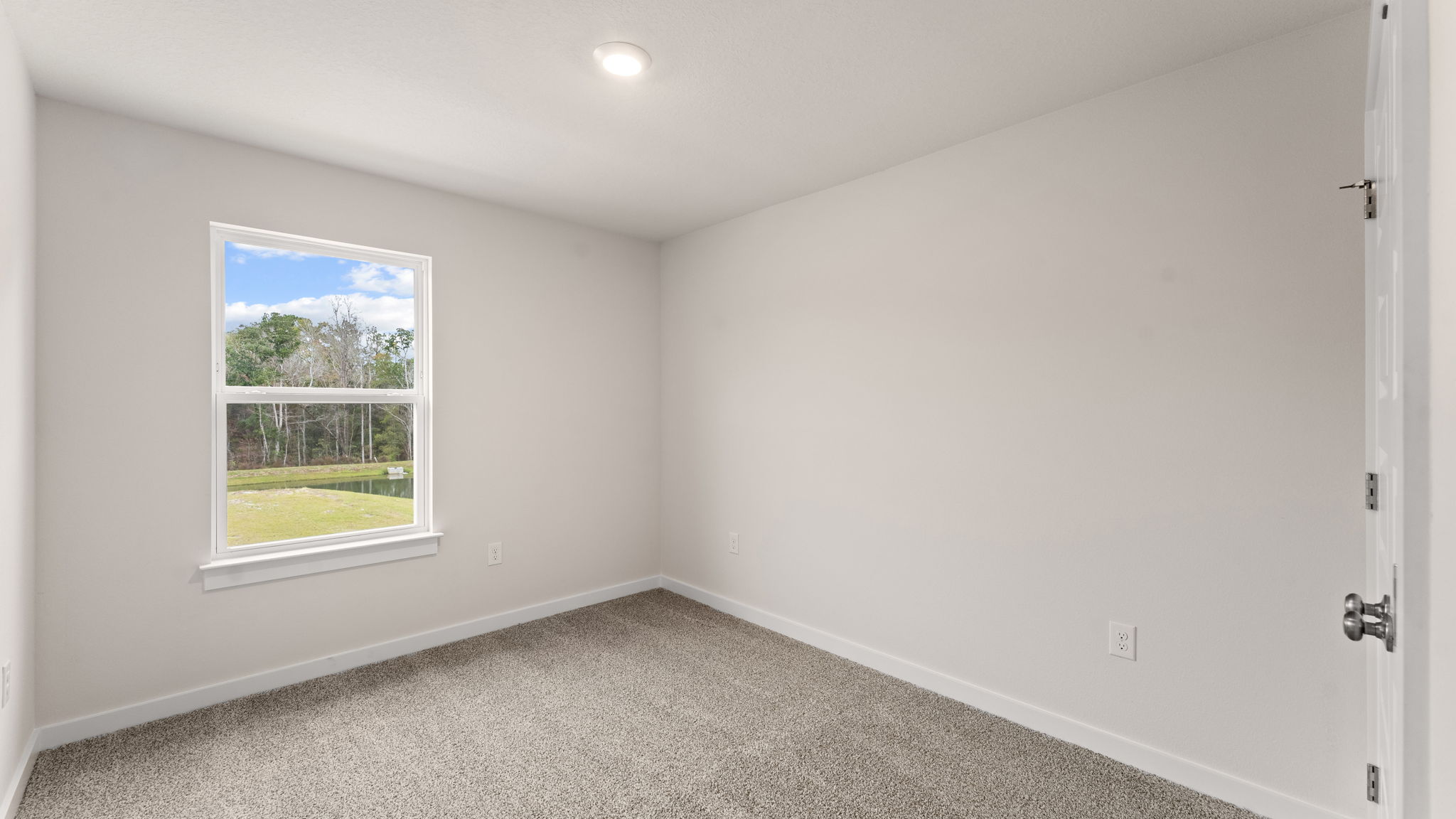 Guest bedroom two has carpet