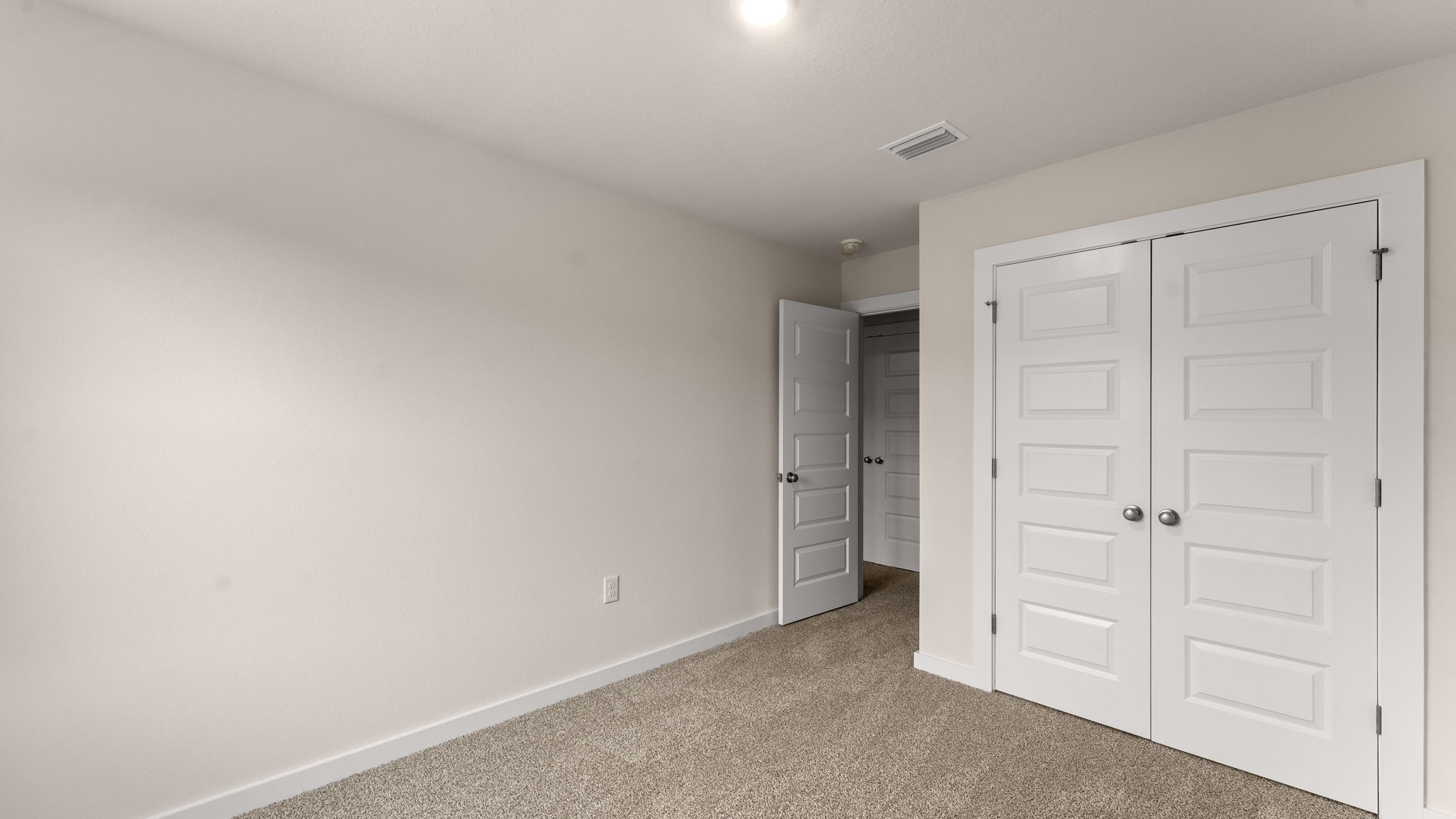 The two additional bedrooms are located on the second level
