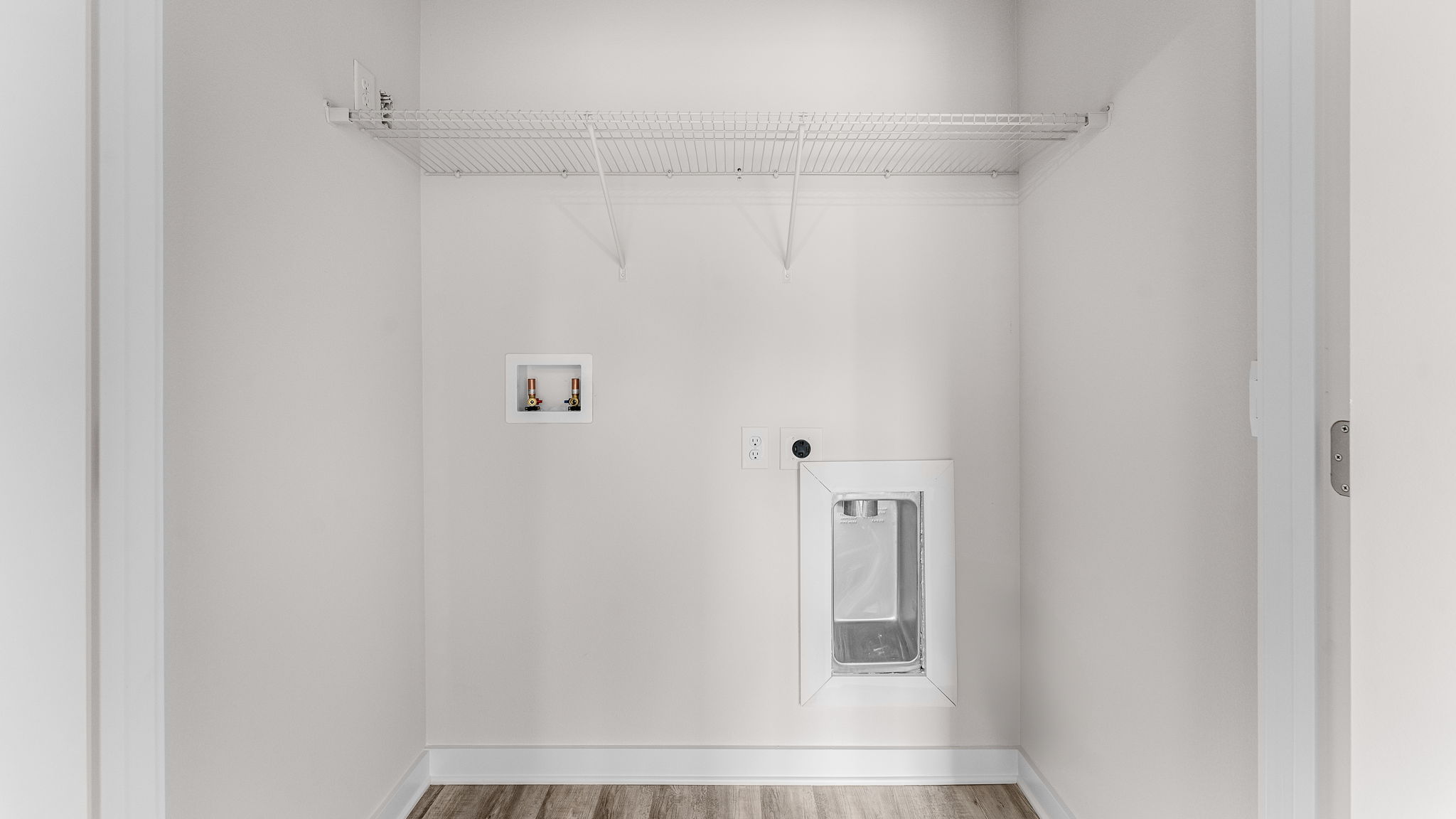 There is a laundry area off the guest bedroom with space for a full size washer and dryer