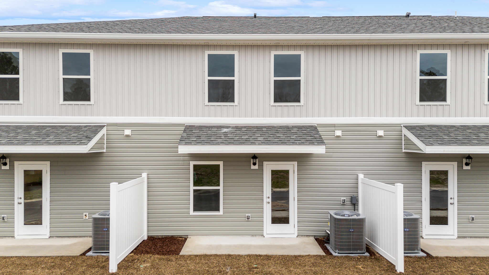 The back of the townhome has a partition between units