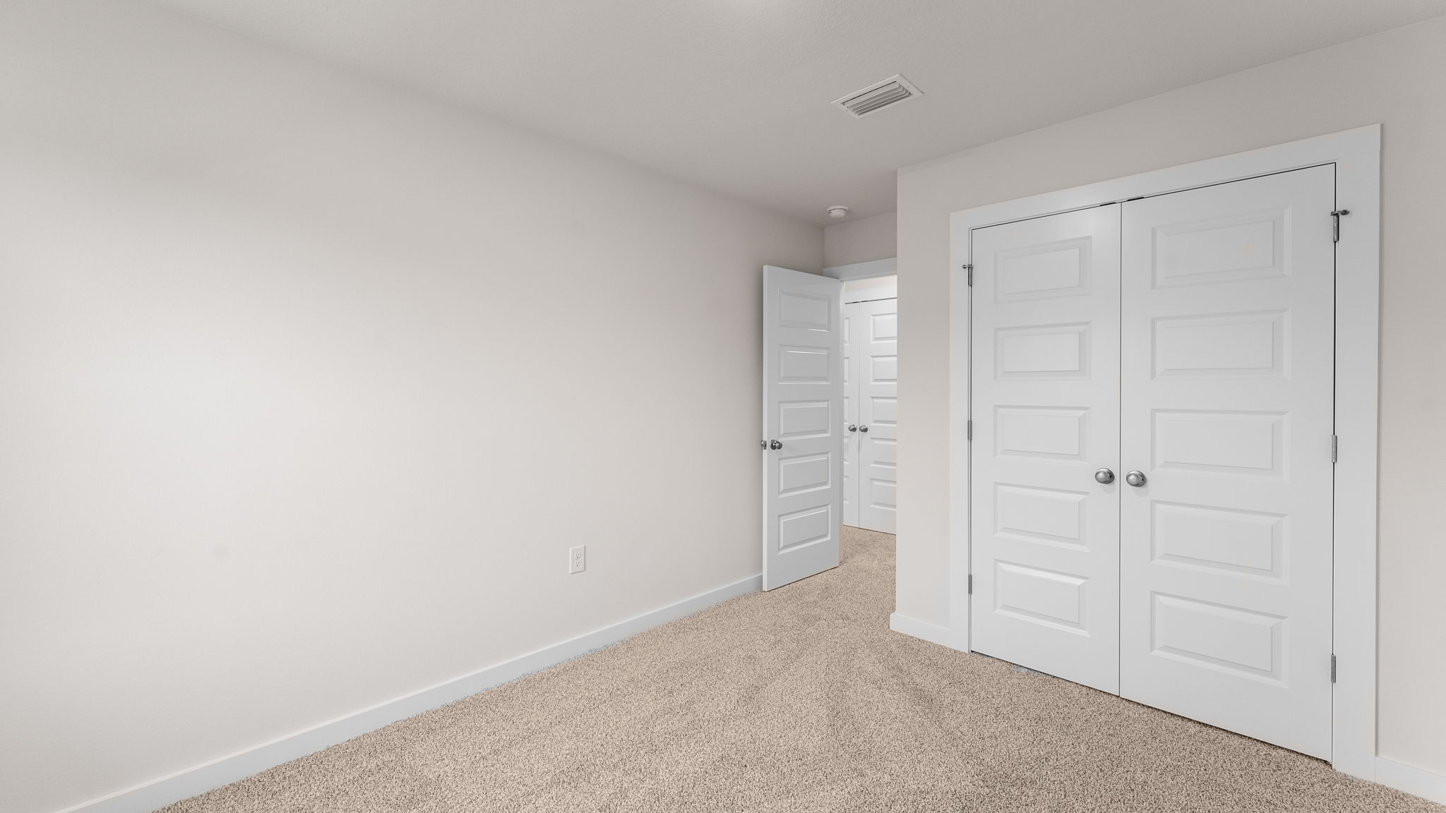 The two additional guest bedrooms are on the second level