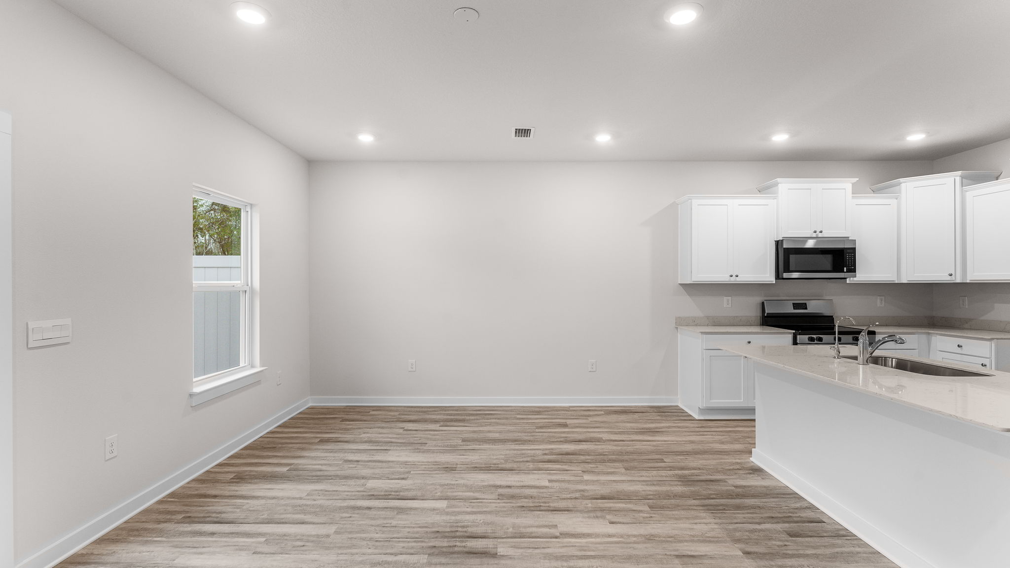 The dining area is off the kitchen for easy meal service