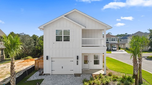 The Monroe has an upstairs balcony and a single car garage