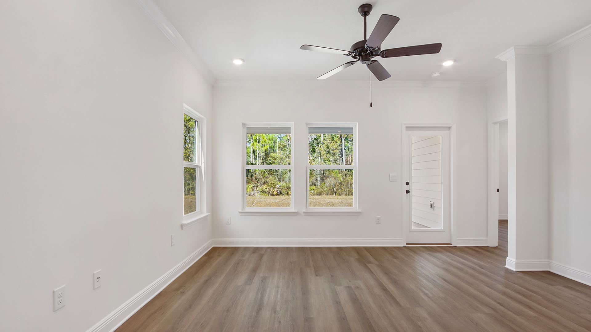 The main level living area is spacious and has access to the covered patio