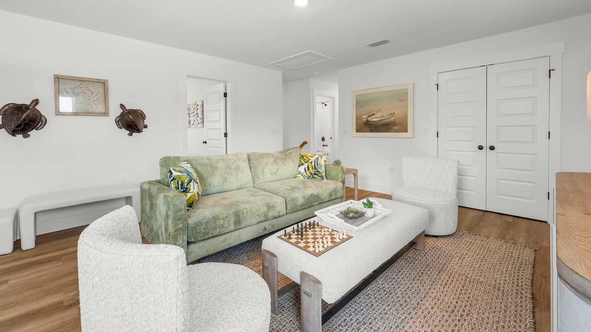 The upstairs living area has EVP flooring