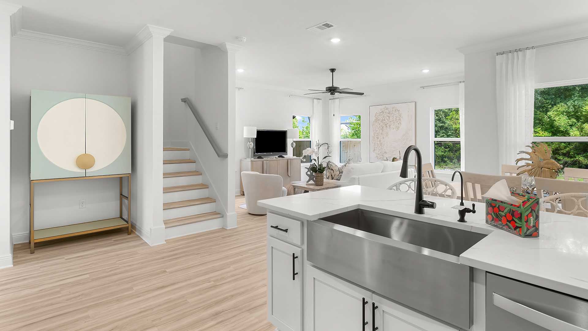 Stairs leading to all bedrooms on the second level