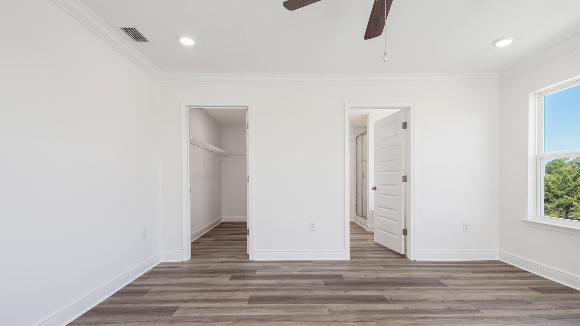 Primary bedroom has a large closet and private ensuite