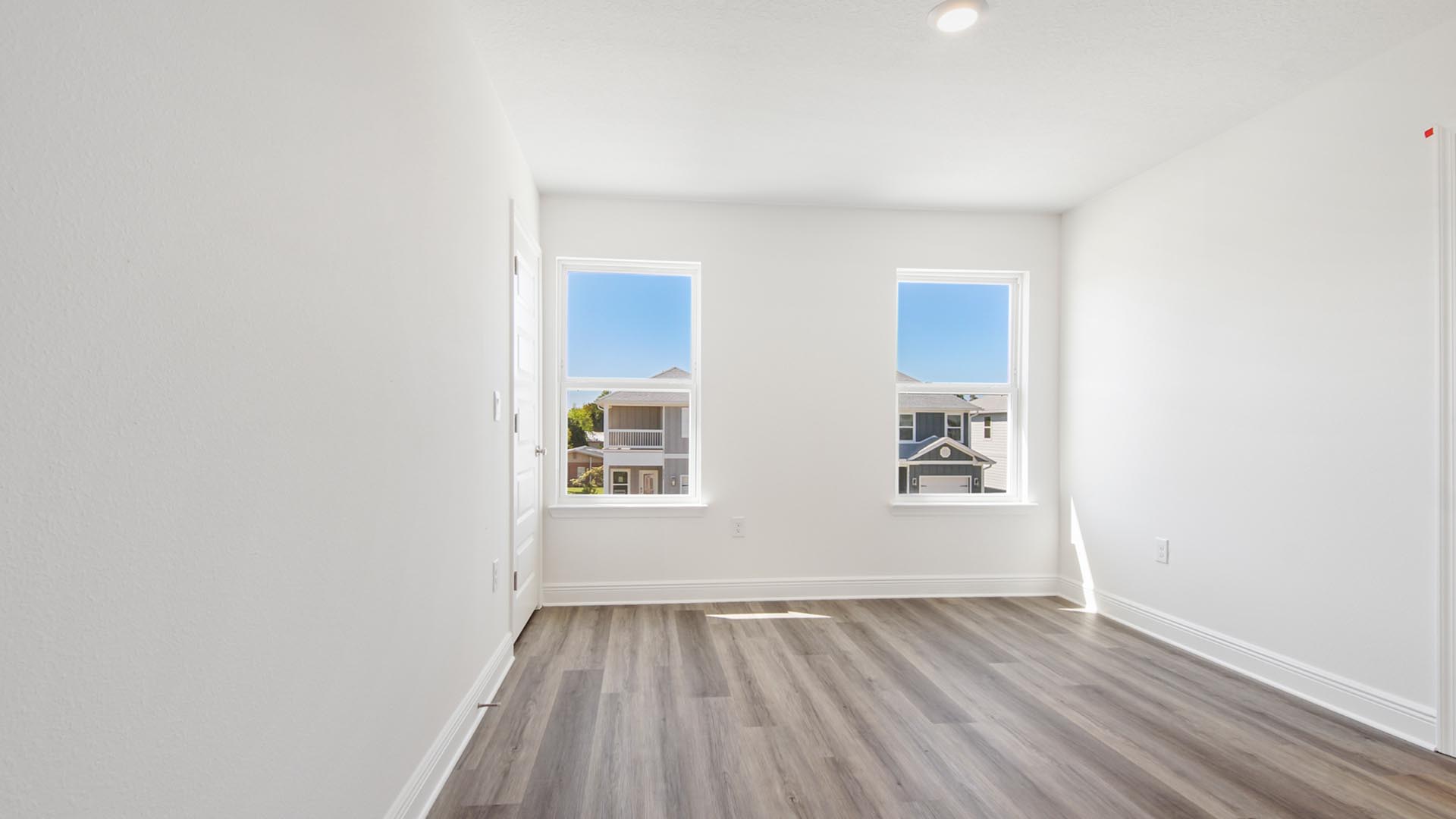 Bedroom three is spacious and has a large closet