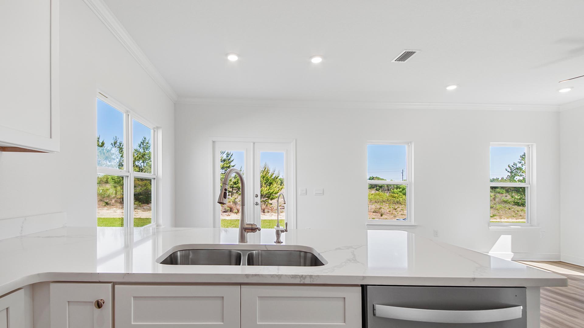 The kitchen looks out to the dining area