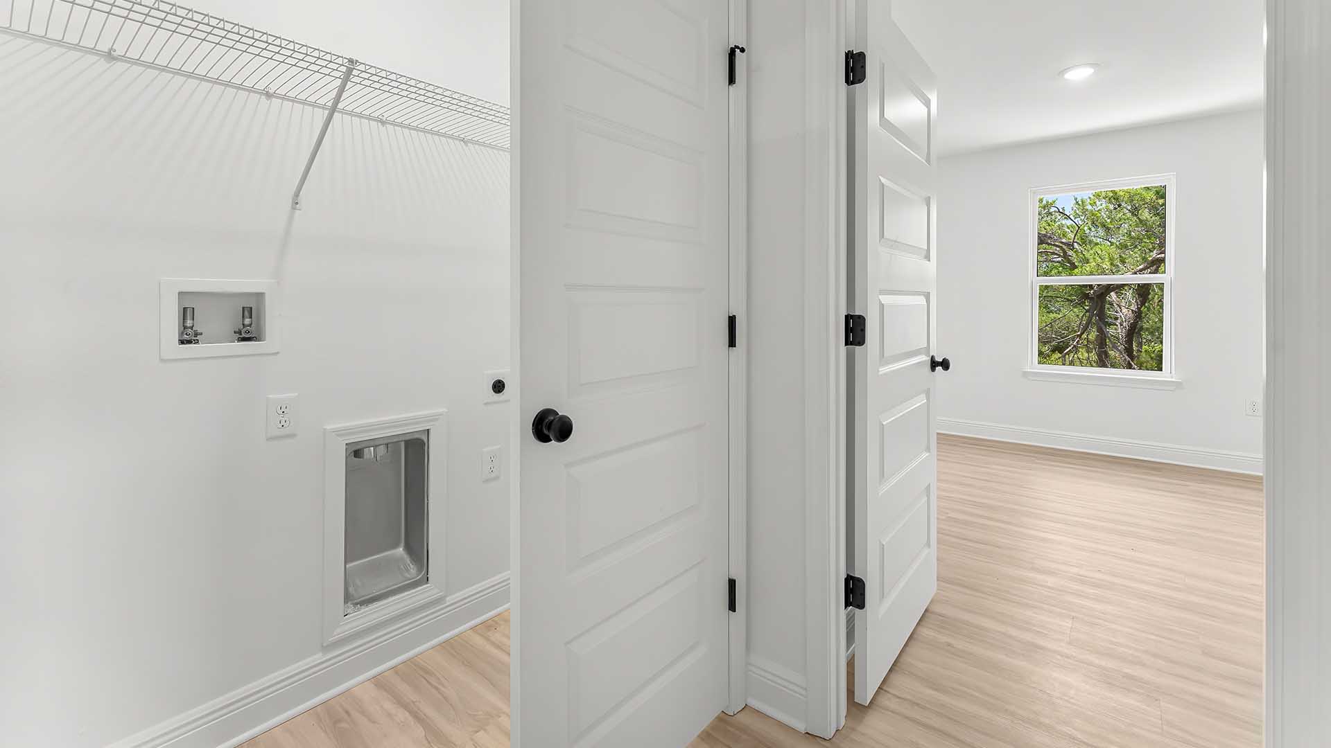 There is a laundry area located on the second level that has space for a full size washer and dryer