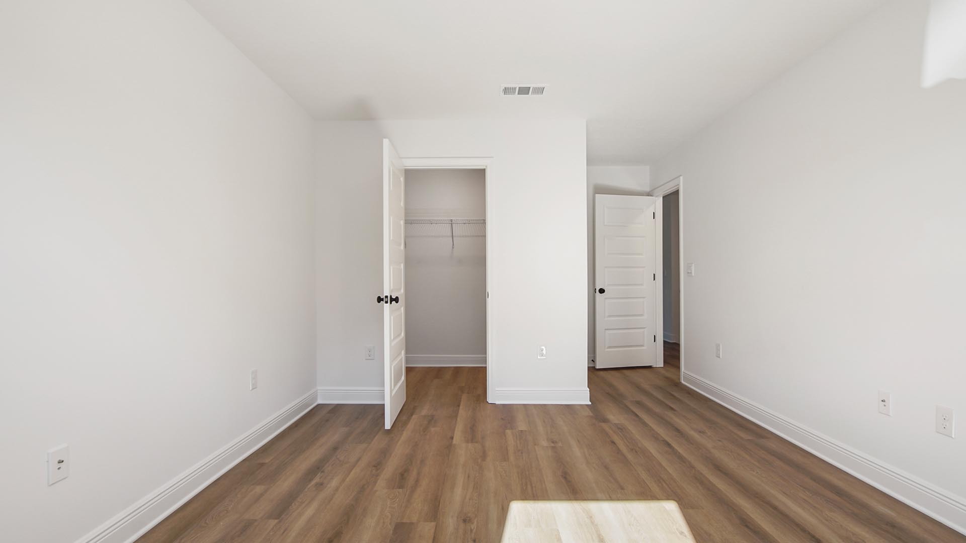 Additional bedroom has EVP flooring