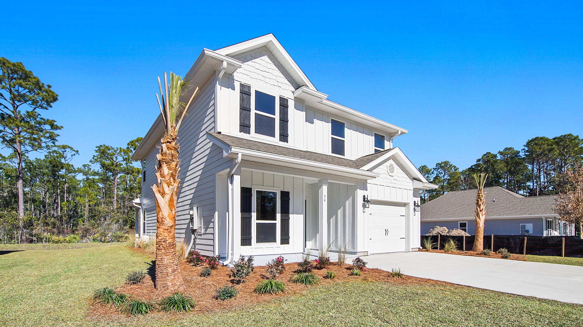 The Alabaster has a covered patio at the front and a single car garage.