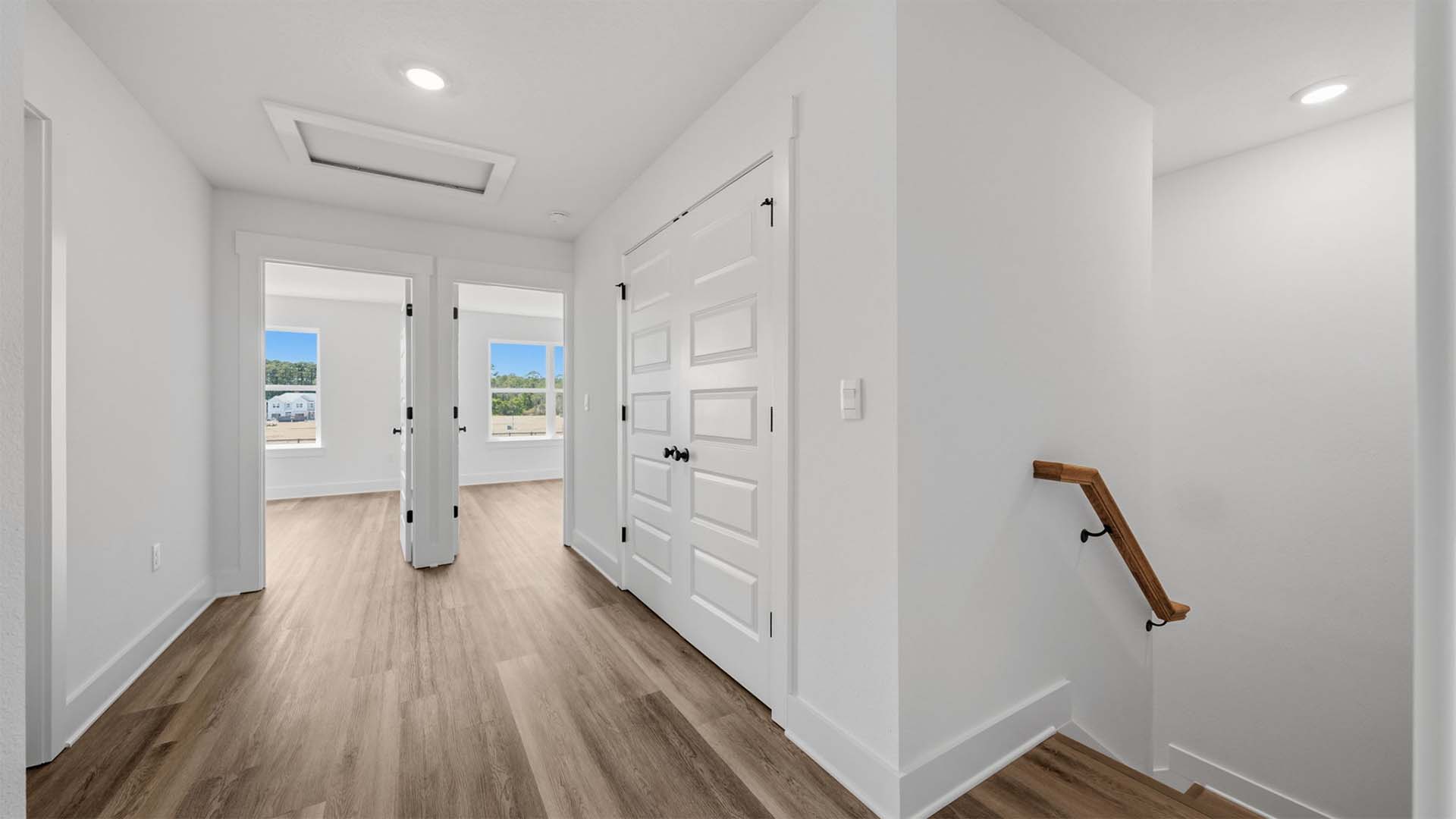 The three bedrooms are on the second level