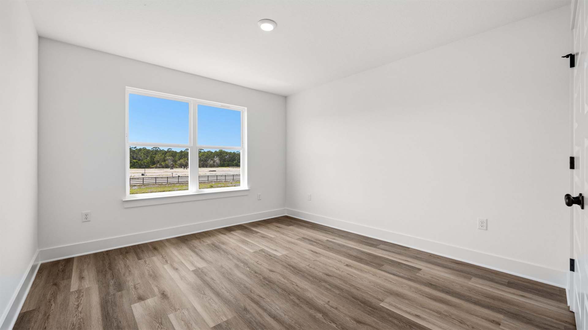 Two guest bedrooms have EVP flooring