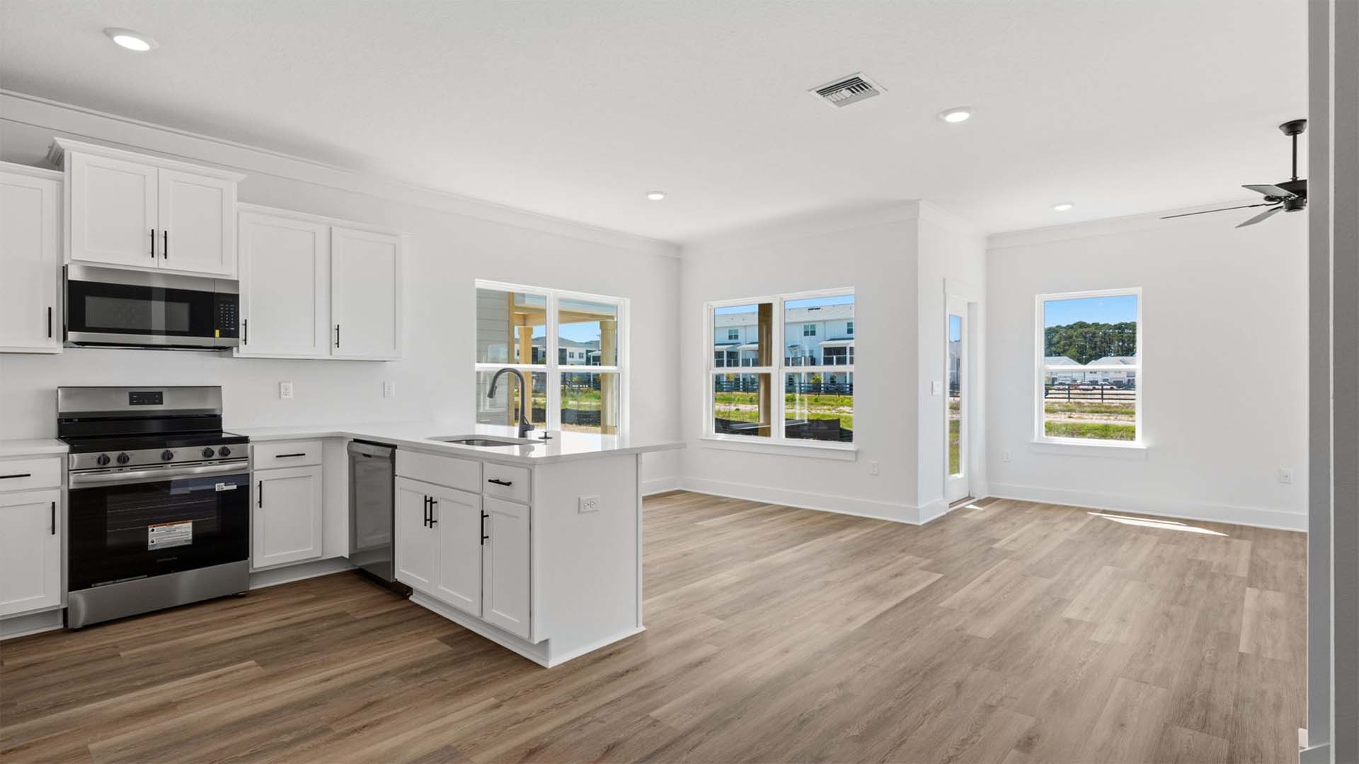 The open concept design of the main level dining and living provides comfort and functionality