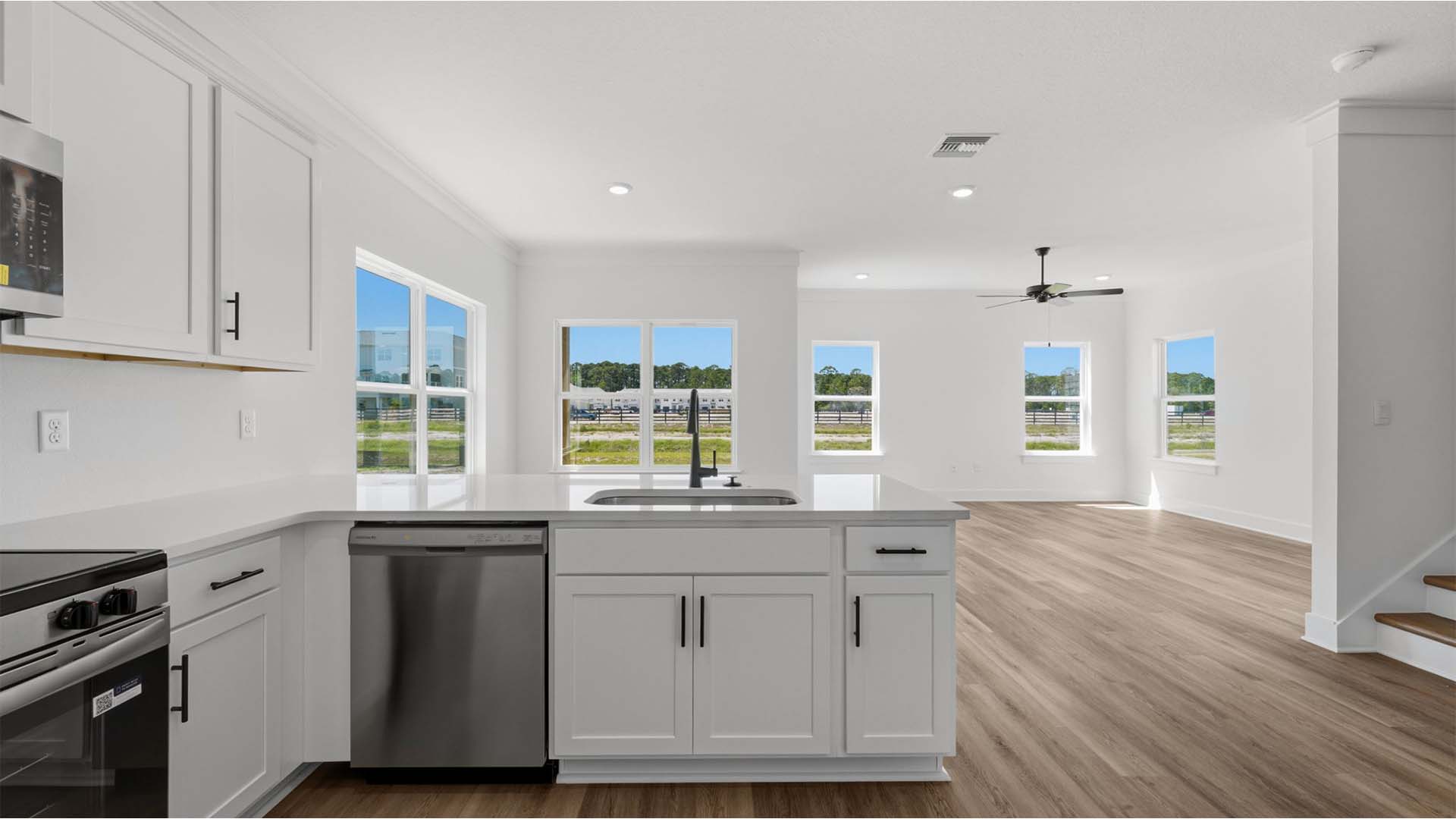 The peninsula bar has lower cabinetry for storage