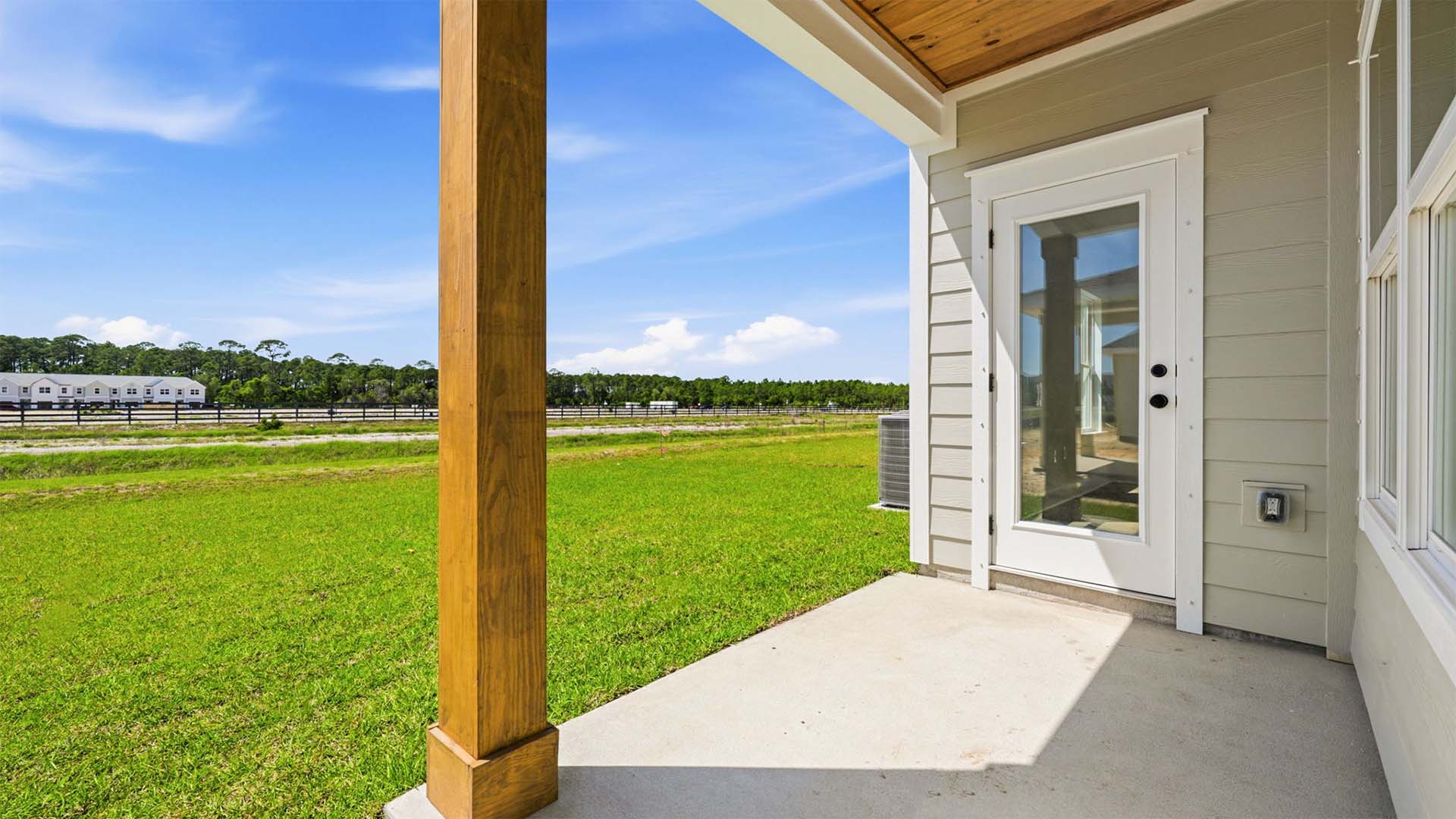 There is a covered back patio accessible from the living area on the main level
