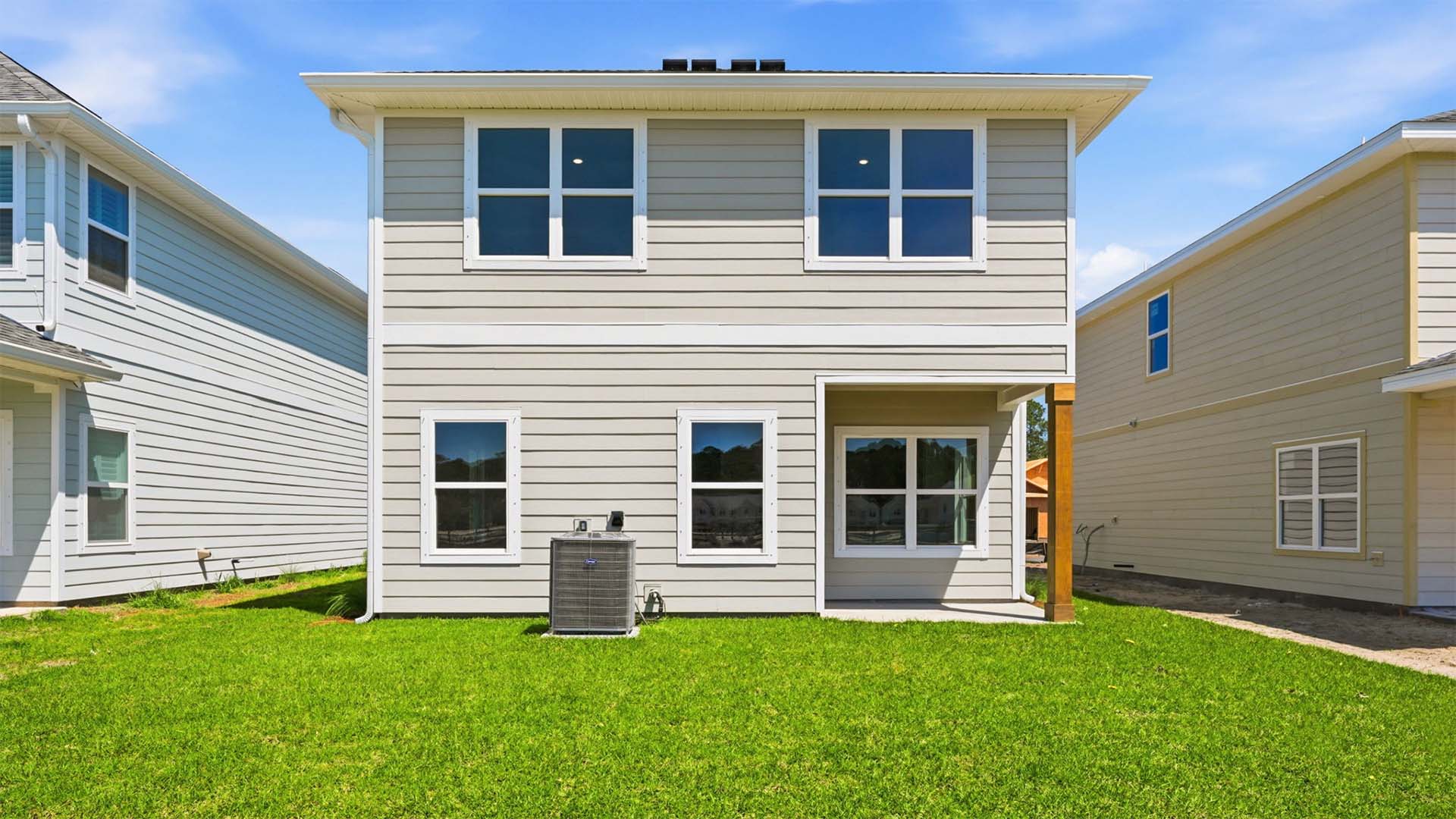 There is a covered back patio accessible from the living area on the main level