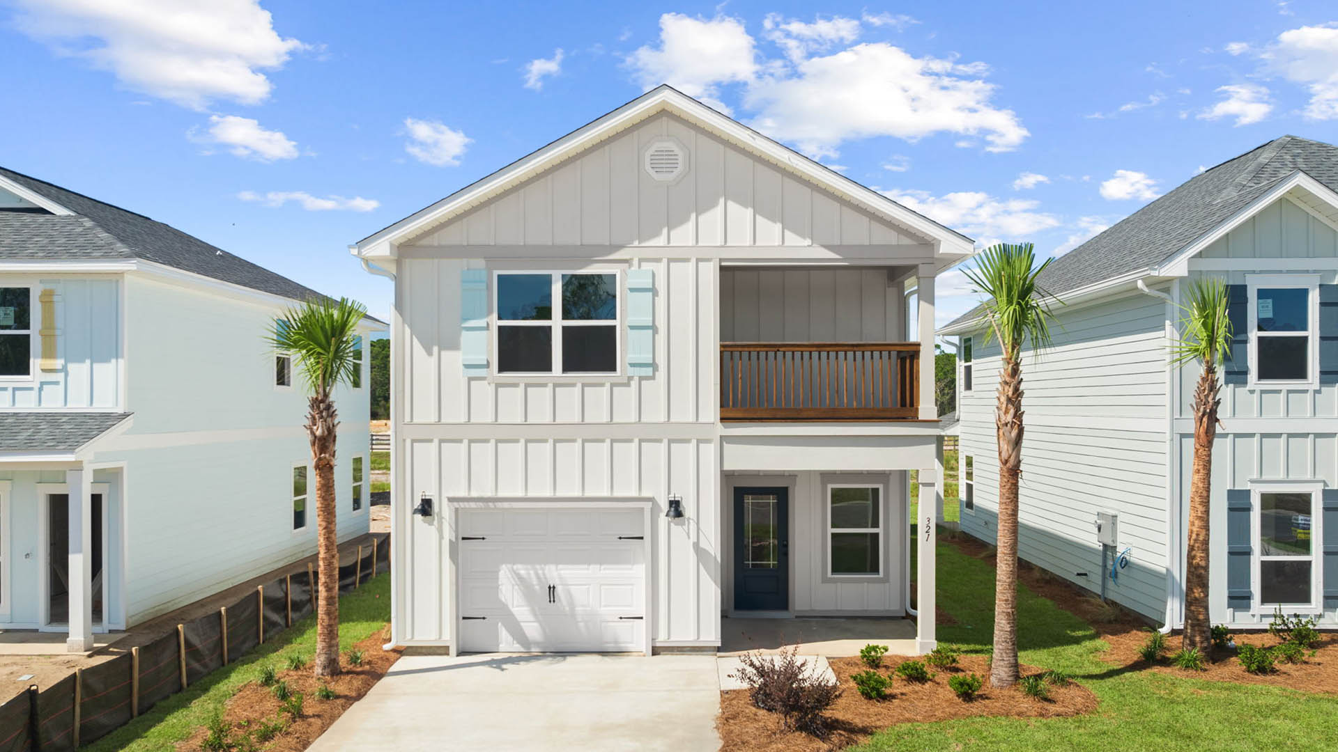 The Monroe floor plan is a three bedroom two and a half bathroom home