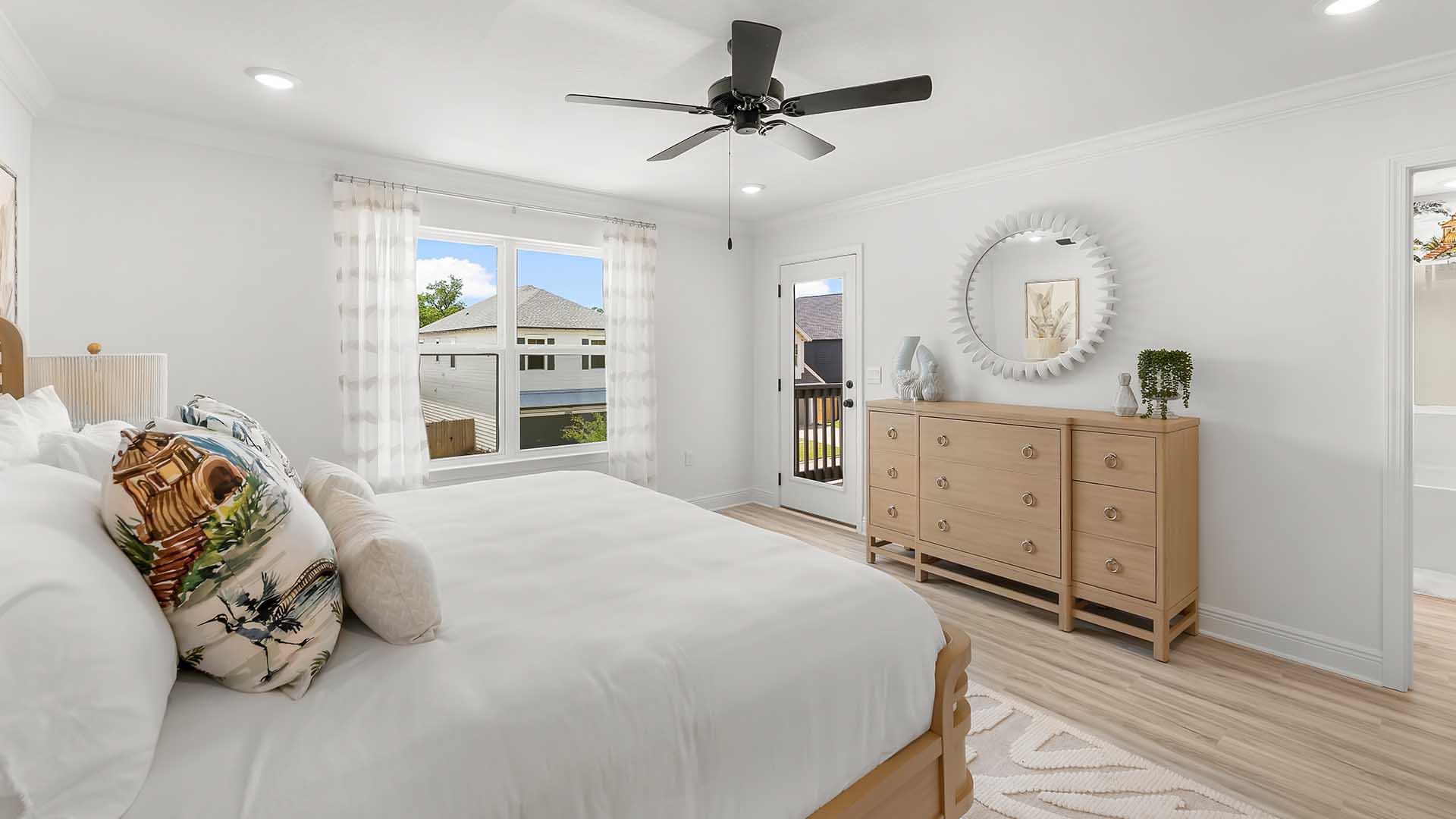 The primary bedroom is located away from the additional bedrooms for privacy