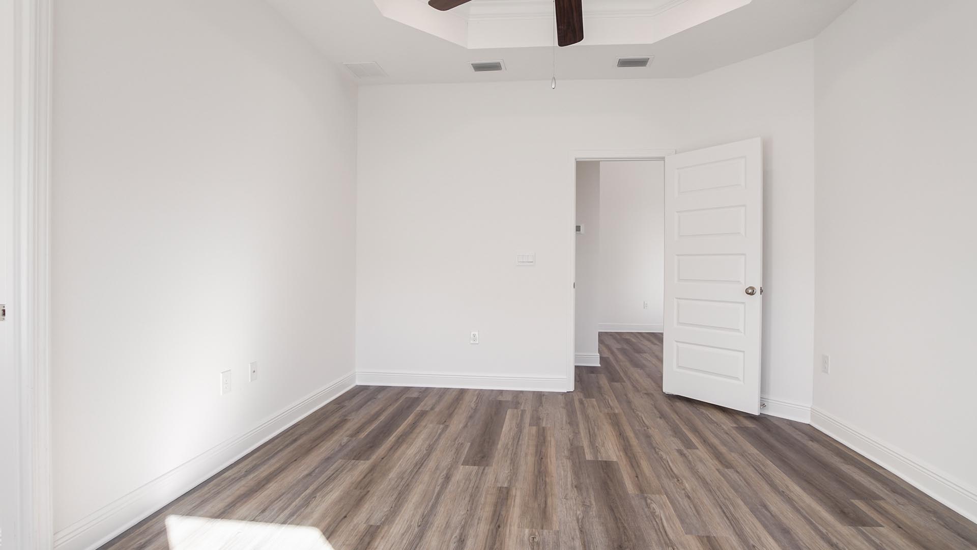 The primary bedroom has a private ensuite bathroom