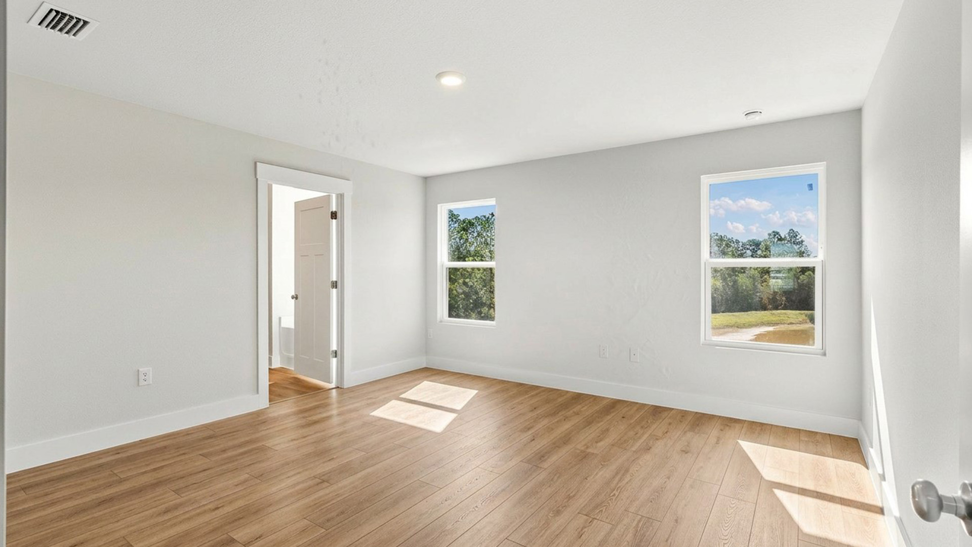 Upstairs you will find the primary bedroom and three guest bedrooms