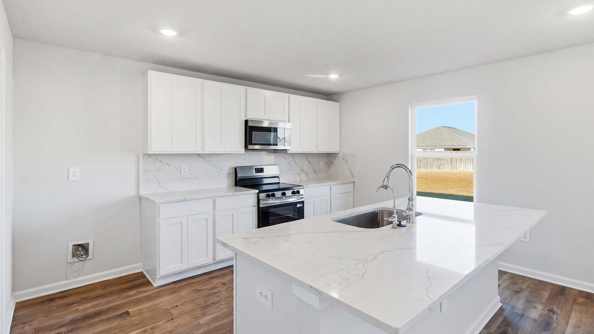 The kitchen has a center island