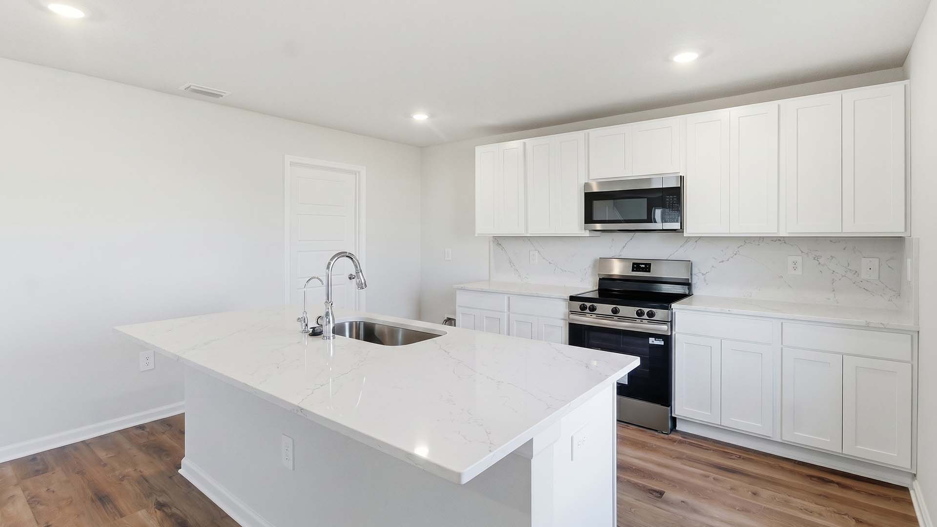 The center island has quartz countertops