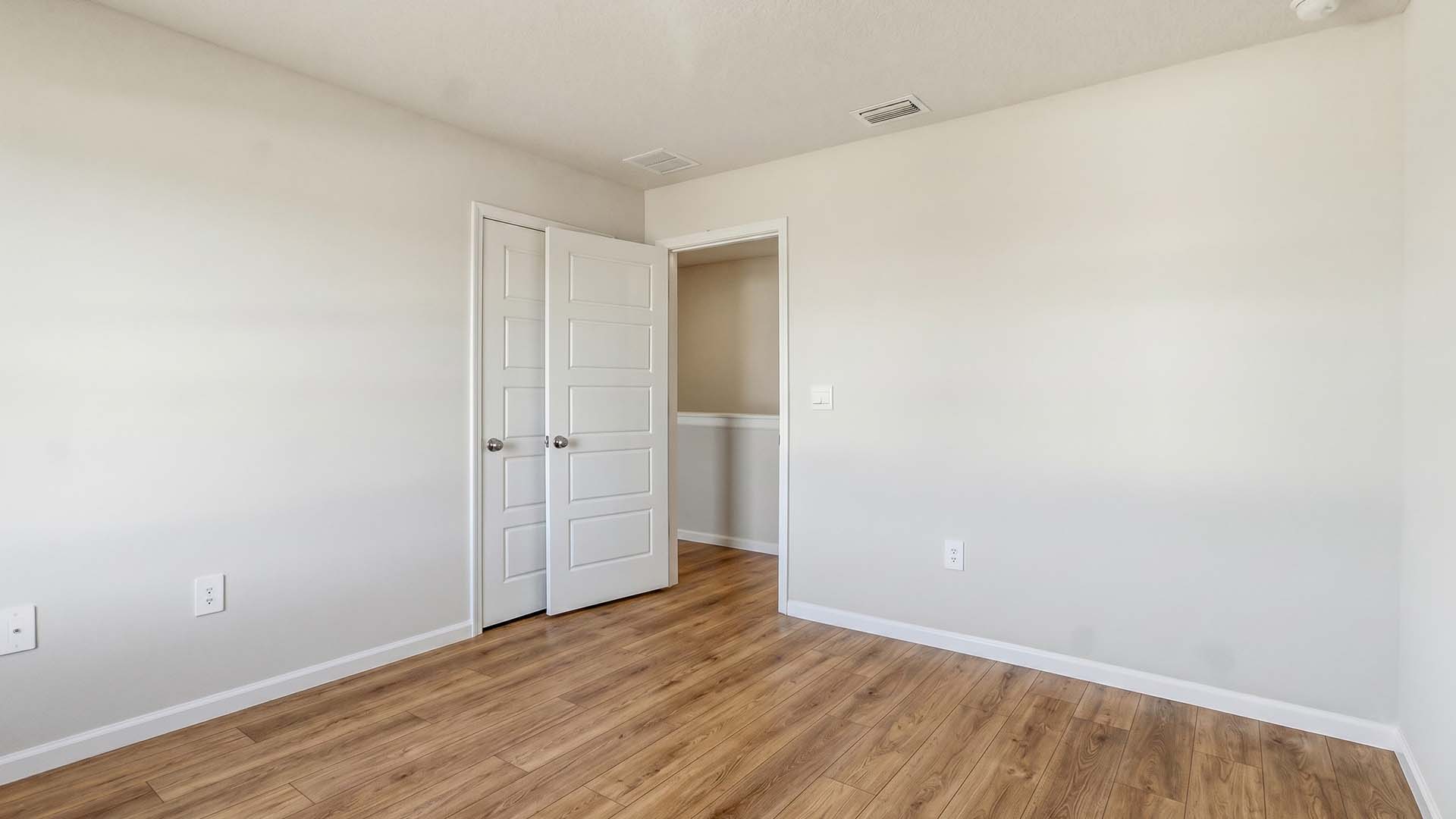 Guest bedroom two has EVP flooring