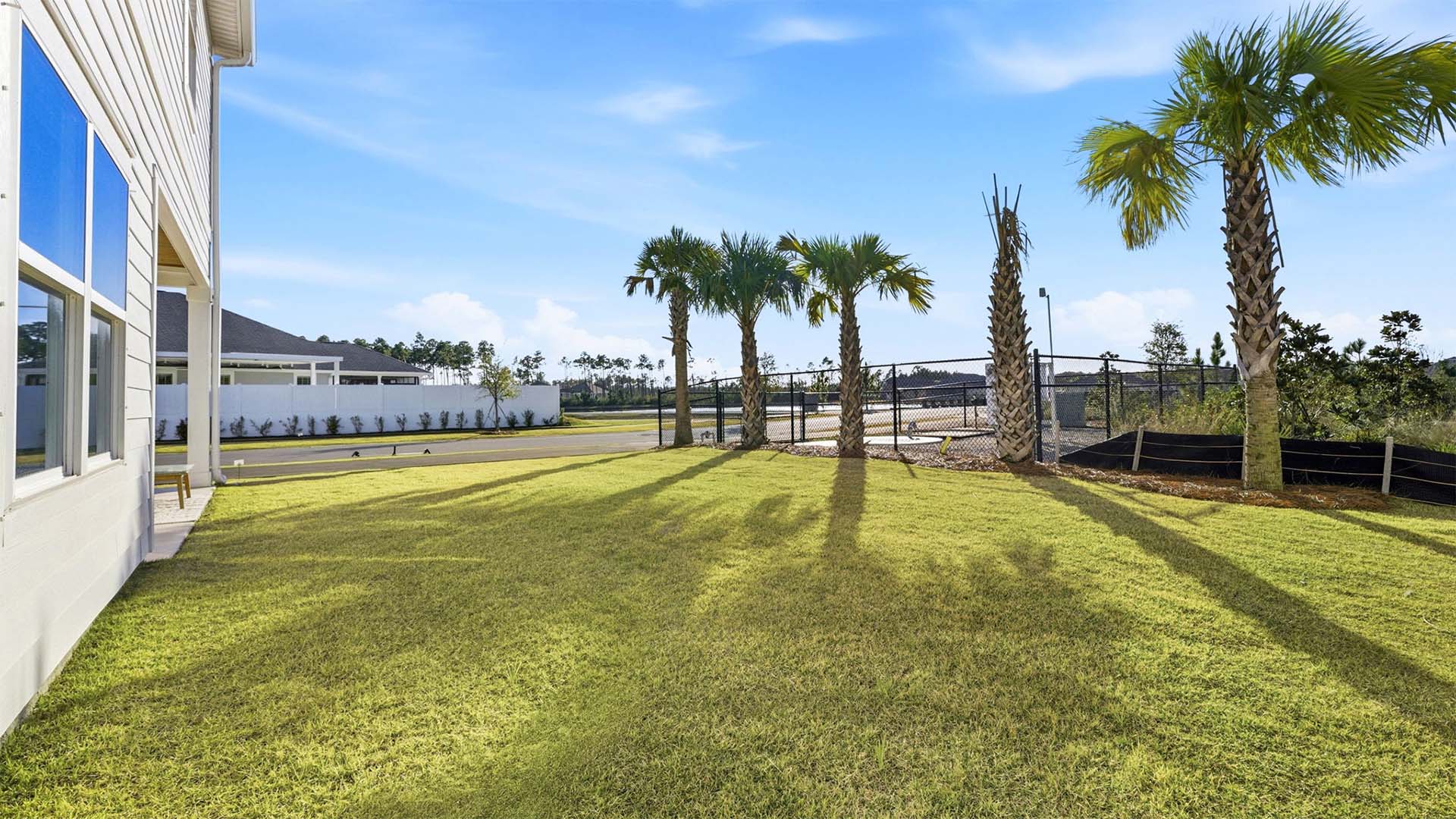 701 Longpoint Way is situated on a corner lot