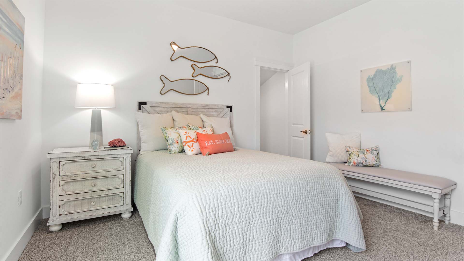Bedroom two with carpet flooring.