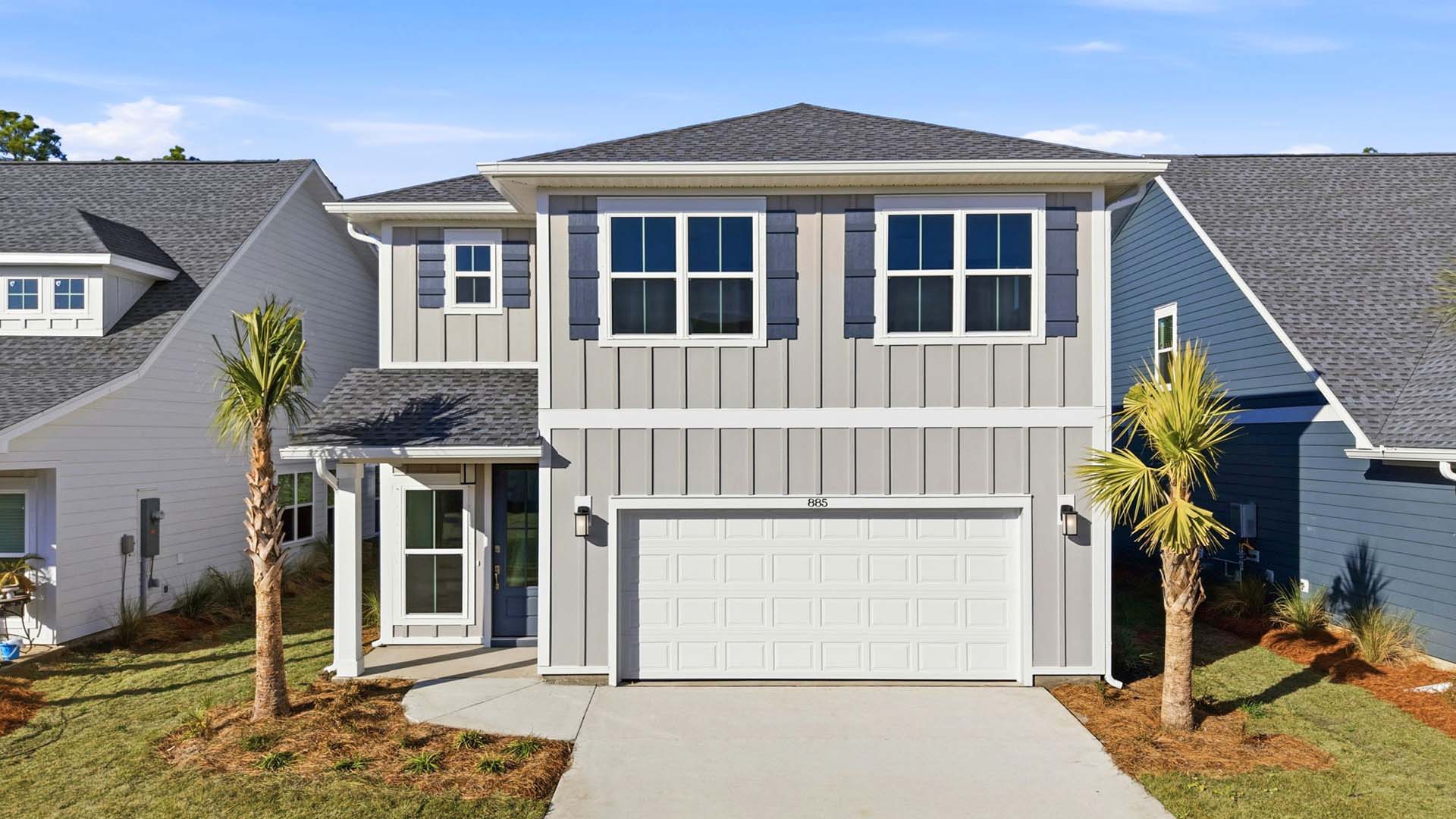 885 Walsonham Drive is ready for move in. This is a two story home with a two car garage and a covered front entry