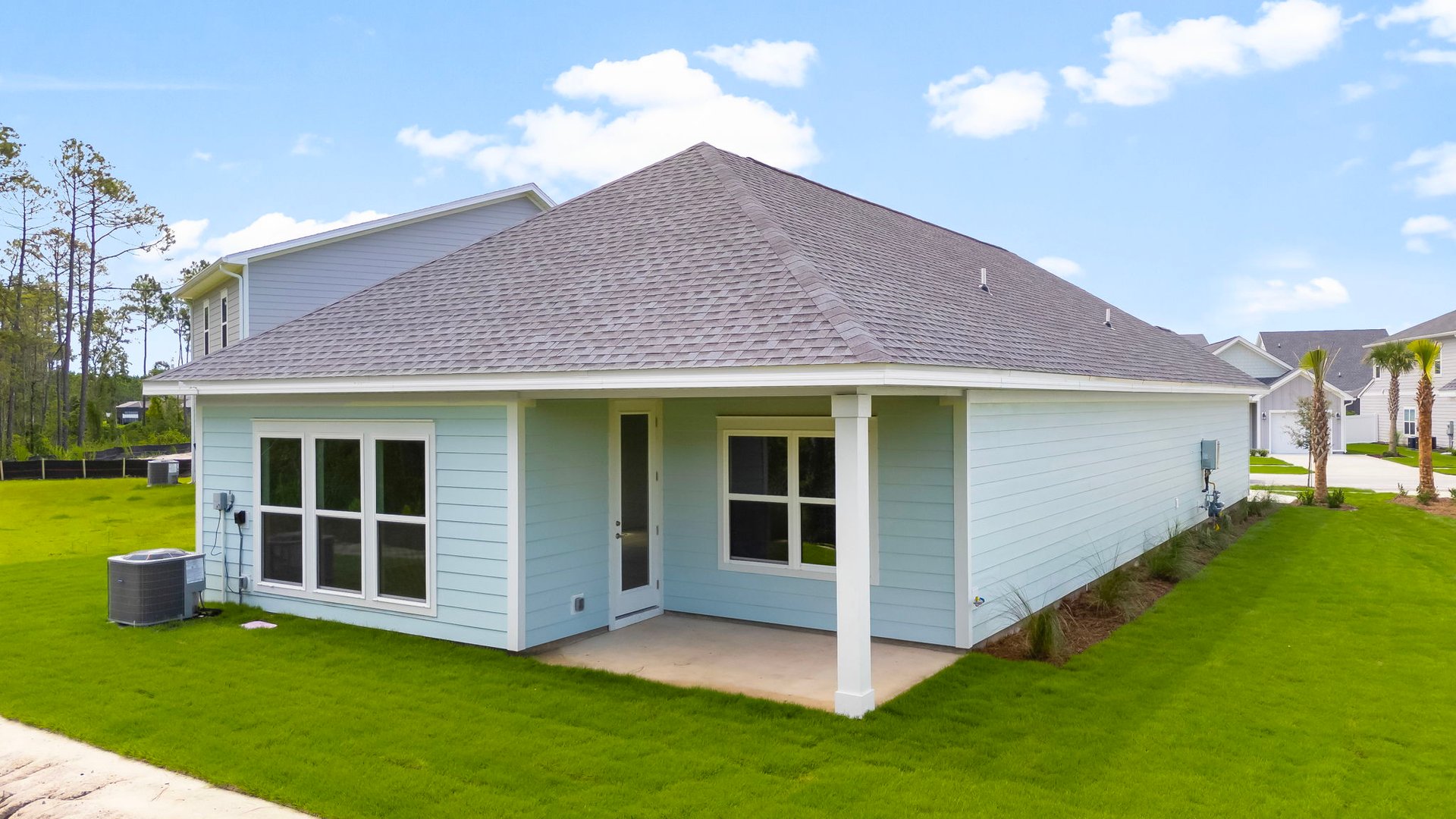 The back of the Bluewater has a covered patio