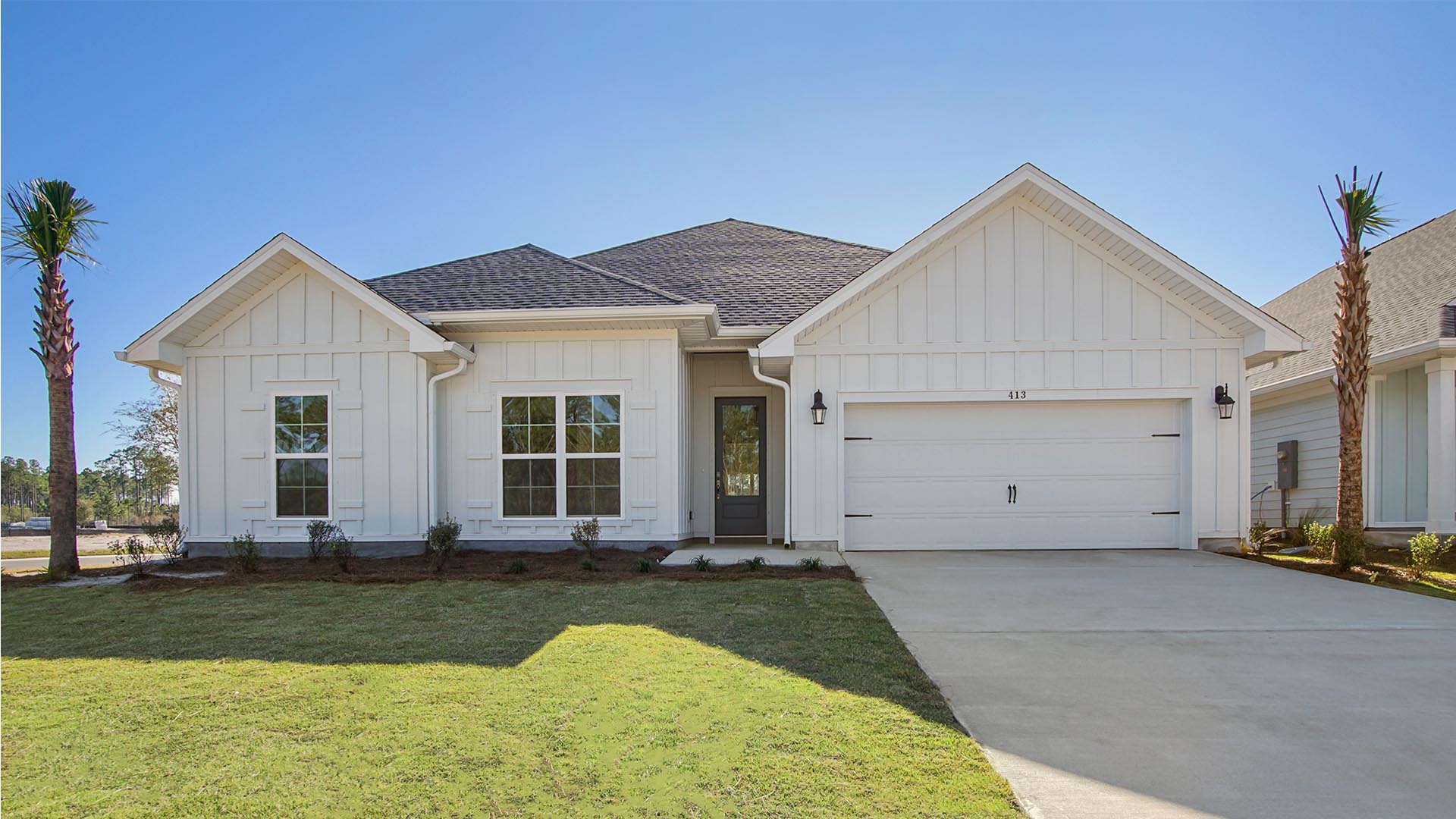 973 Crystal Bayou Boulevard is under construction. Image is of a similar Camellia at completion