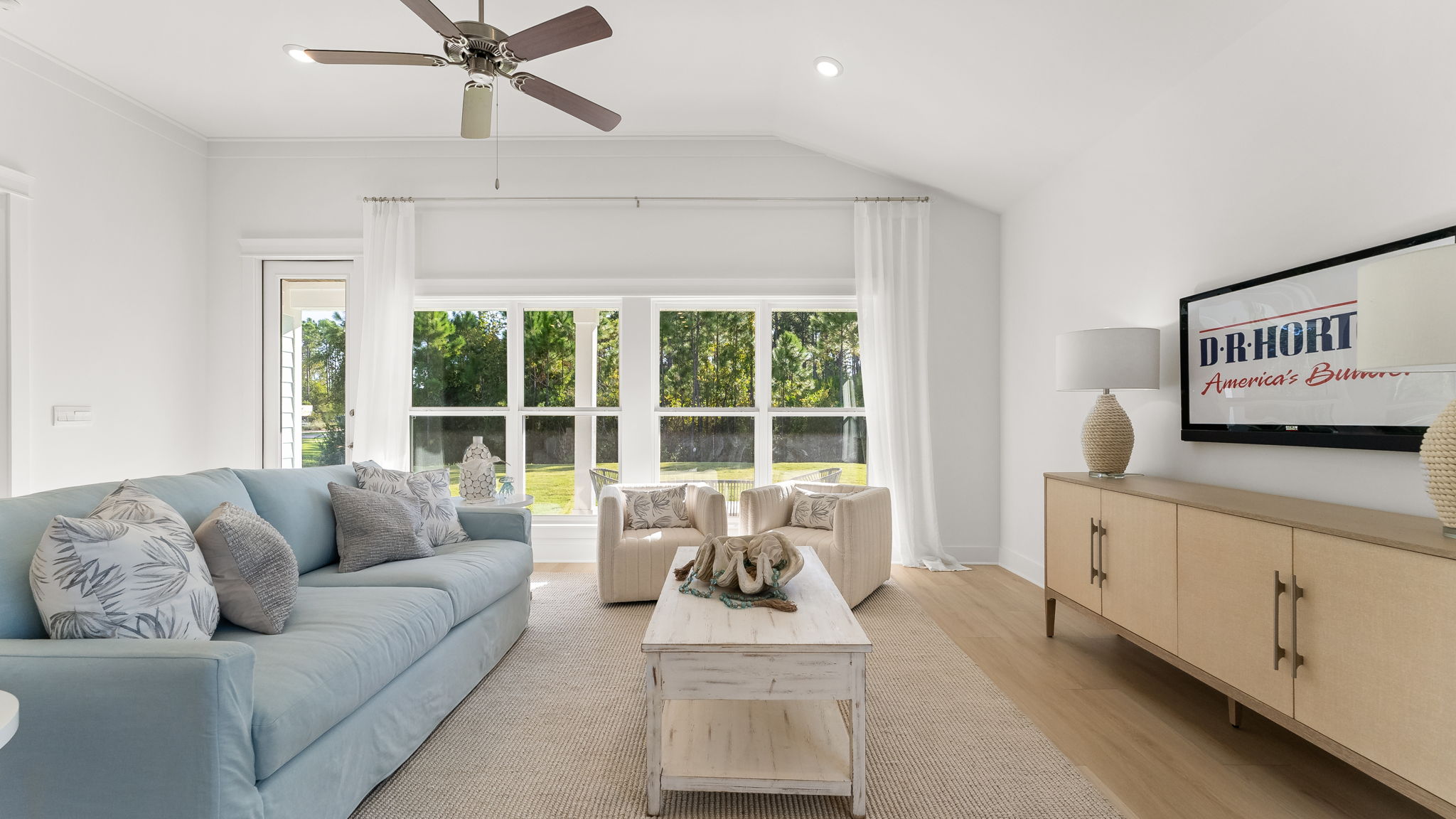 The kitchen is open to the living and casual dining area